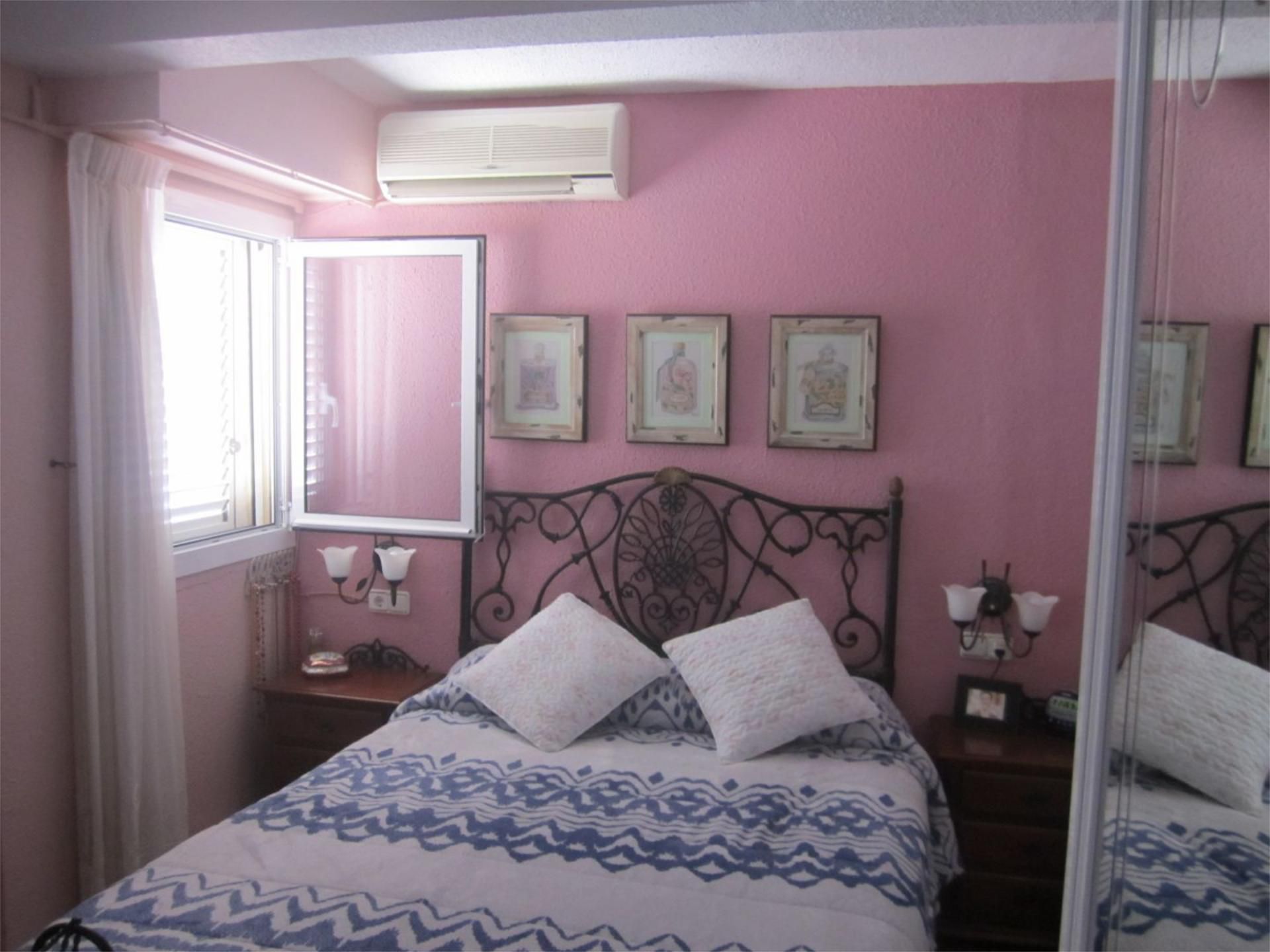 Dormitori de Apartament de lloguer en Puçol amb Aire condicionat, Calefacció i Jardí privat