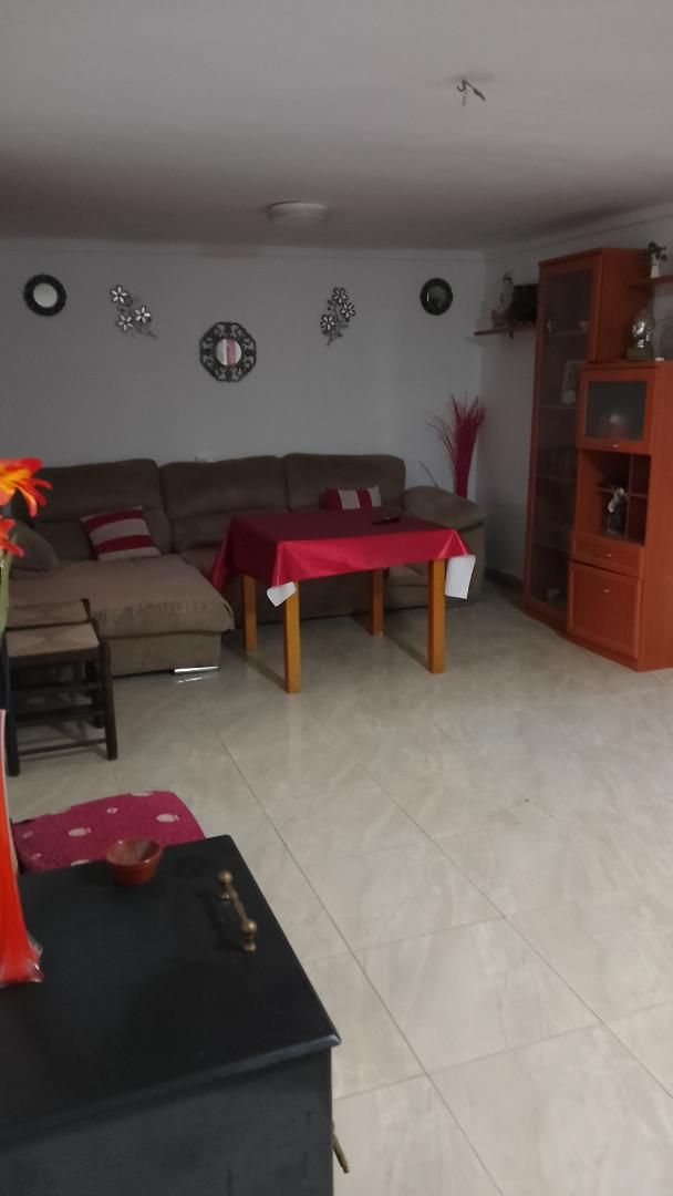 Sala d'estar de Casa adosada en venda en Santa Elena amb Calefacció, Jardí privat i Terrassa