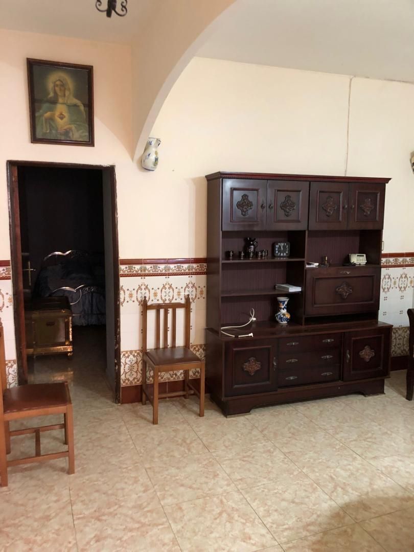 Sala d'estar de Casa o xalet en venda en Madroñera amb Jardí privat, Terrassa i Moblat