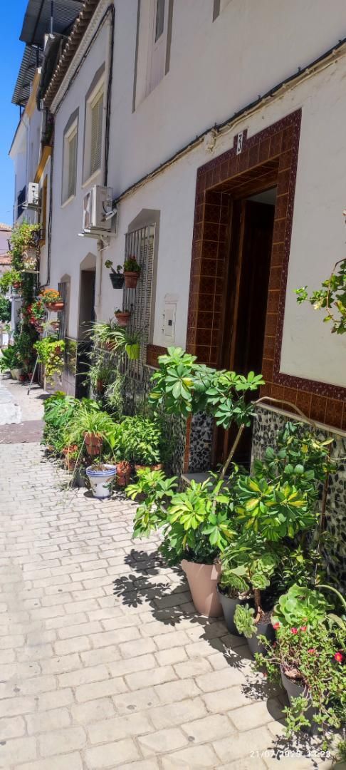 Jardí de Casa adosada en venda en Cuevas de San Marcos amb Aire condicionat, Calefacció i Terrassa