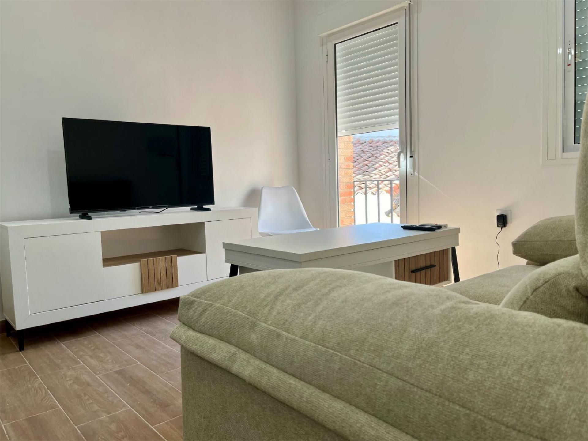Sala d'estar de Pis de lloguer en Berlanga amb Aire condicionat, Moblat i Balcó