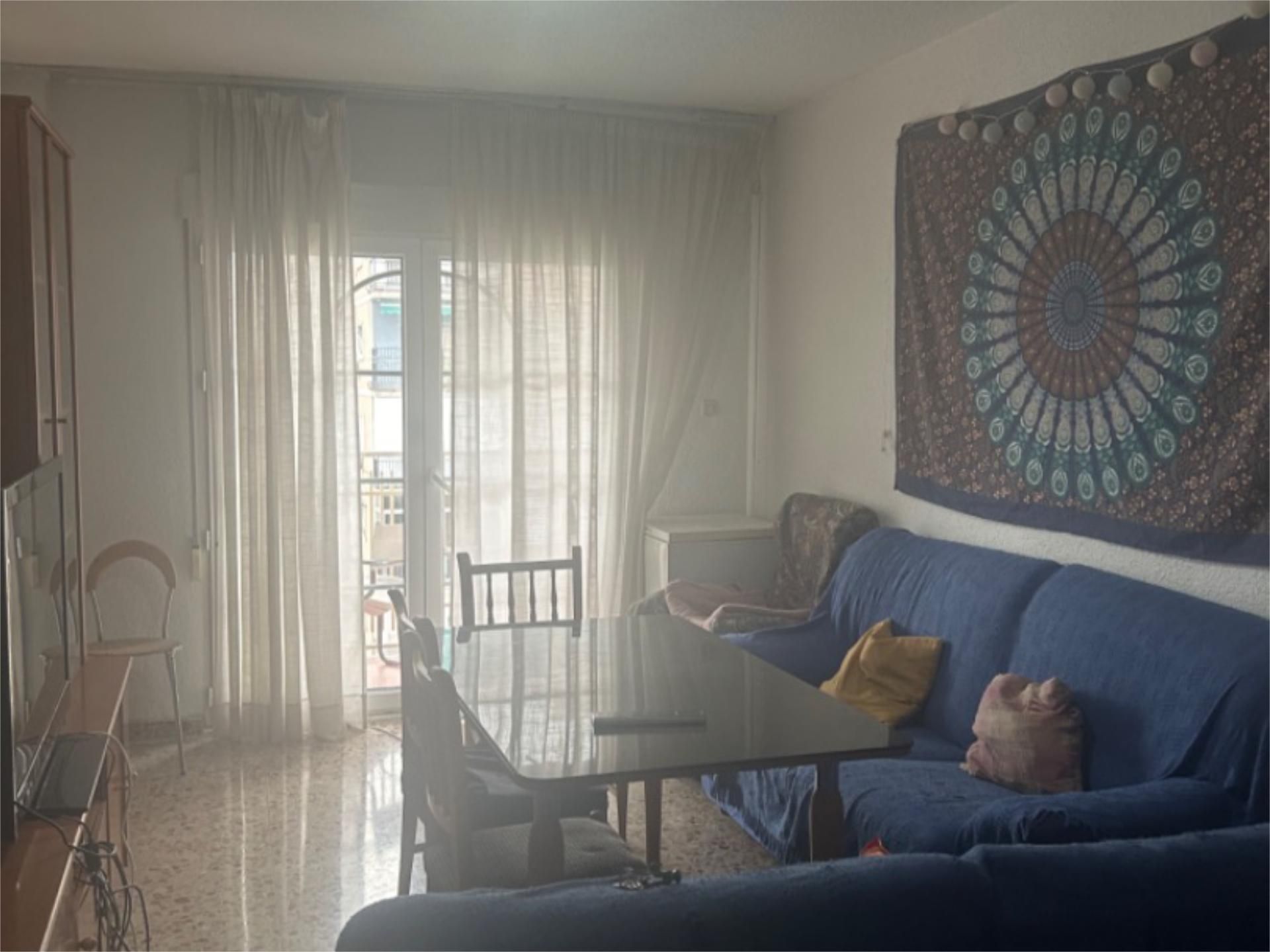 Living room of Flat to share in  Granada Capital  with Heating, Furnished and Balcony