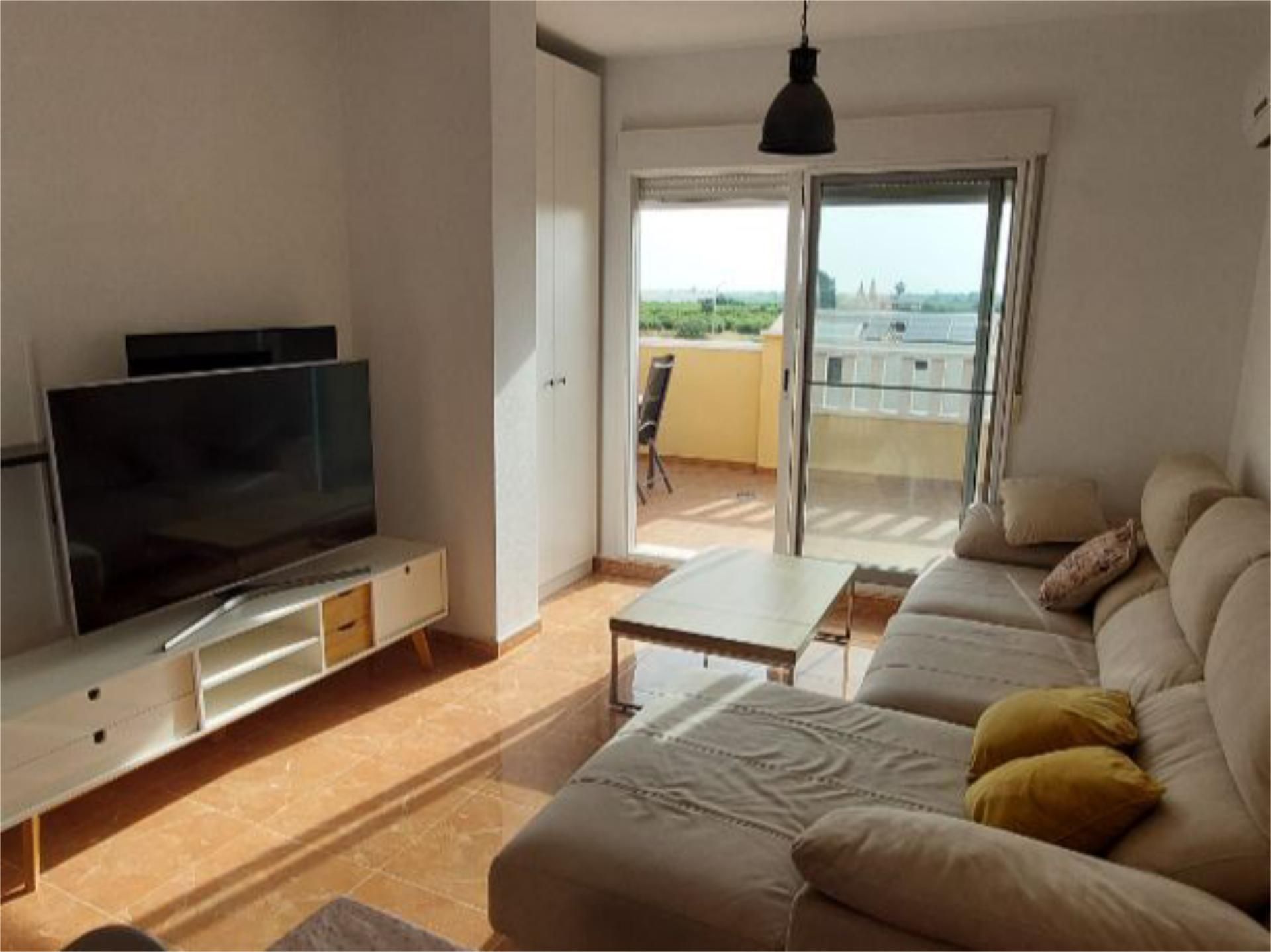 Sala d'estar de Pis de lloguer en Rafal amb Aire condicionat, Terrassa i Piscina