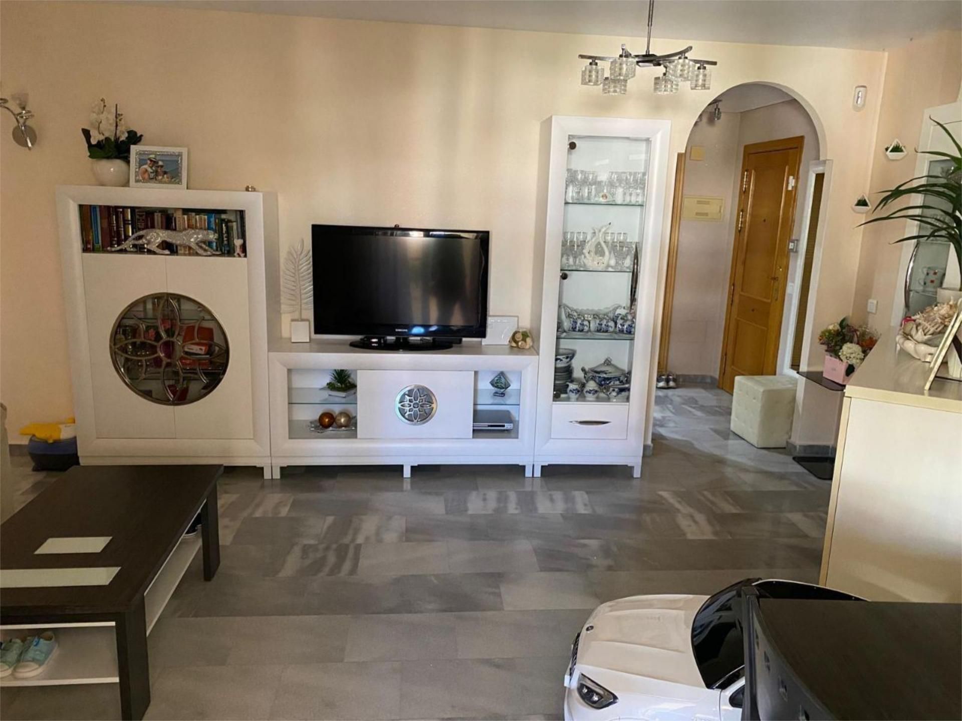 Living room of Flat for sale in Benalmádena  with Air Conditioner, Terrace and Swimming Pool