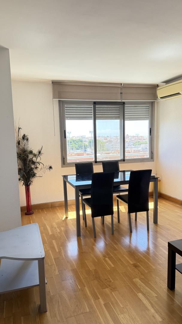 Dining room of Flat for sale in  Almería Capital  with Air Conditioner, Parquet flooring and Furnished