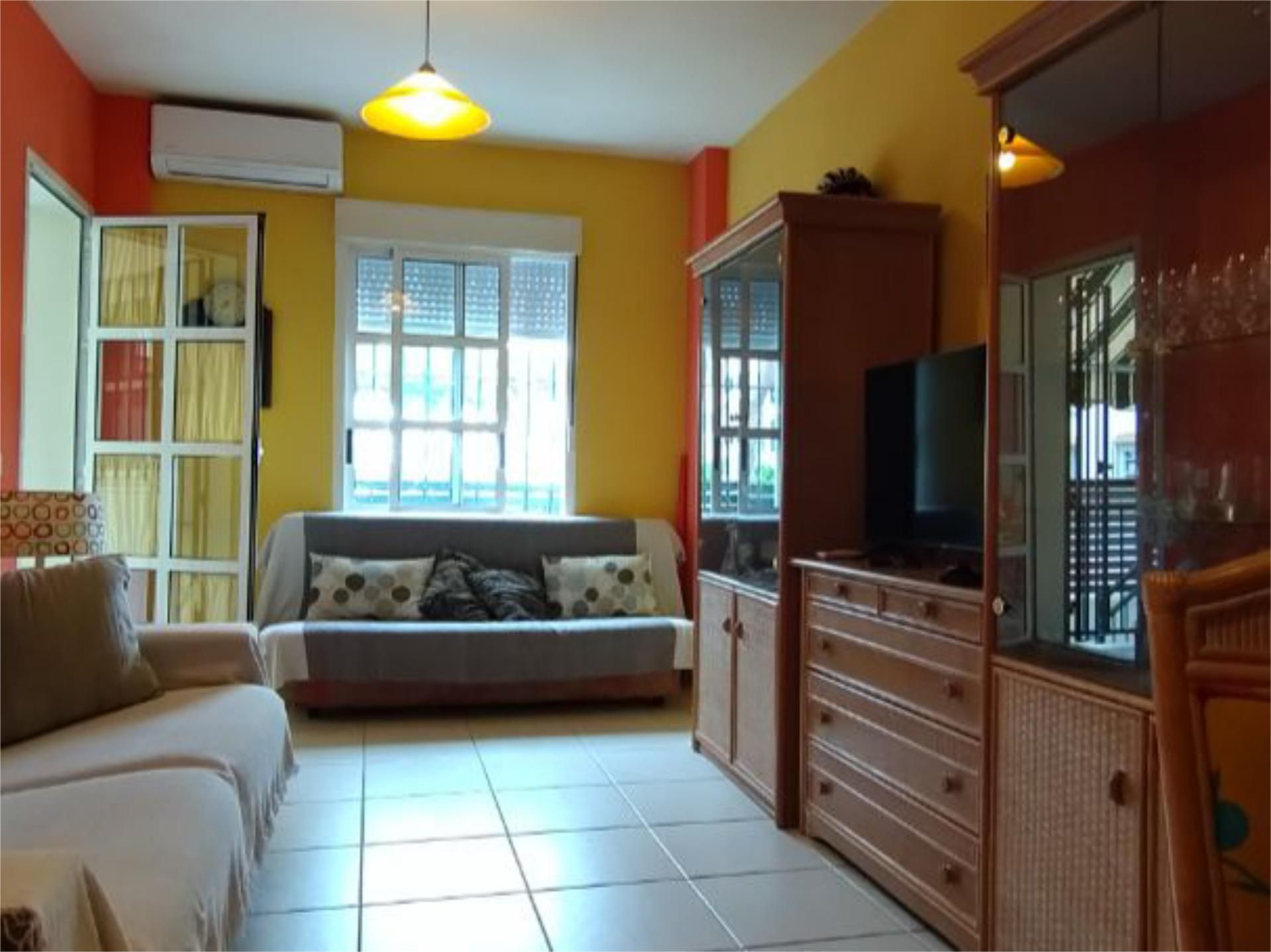 Sala d'estar de Apartament de lloguer en Mazagón amb Aire condicionat, Calefacció i Jardí privat