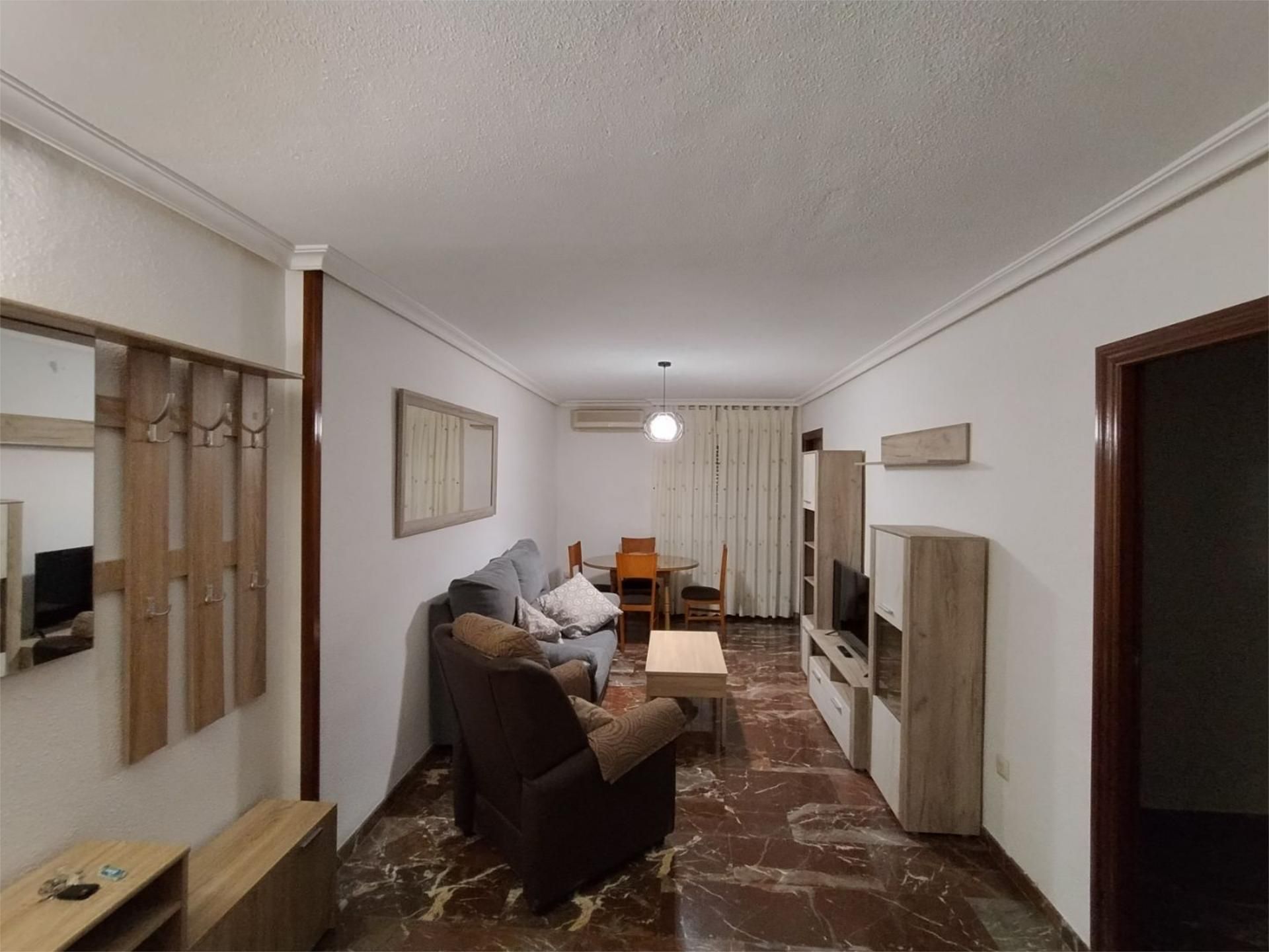 Sala d'estar de Pis de lloguer en  Jaén Capital amb Aire condicionat i Piscina