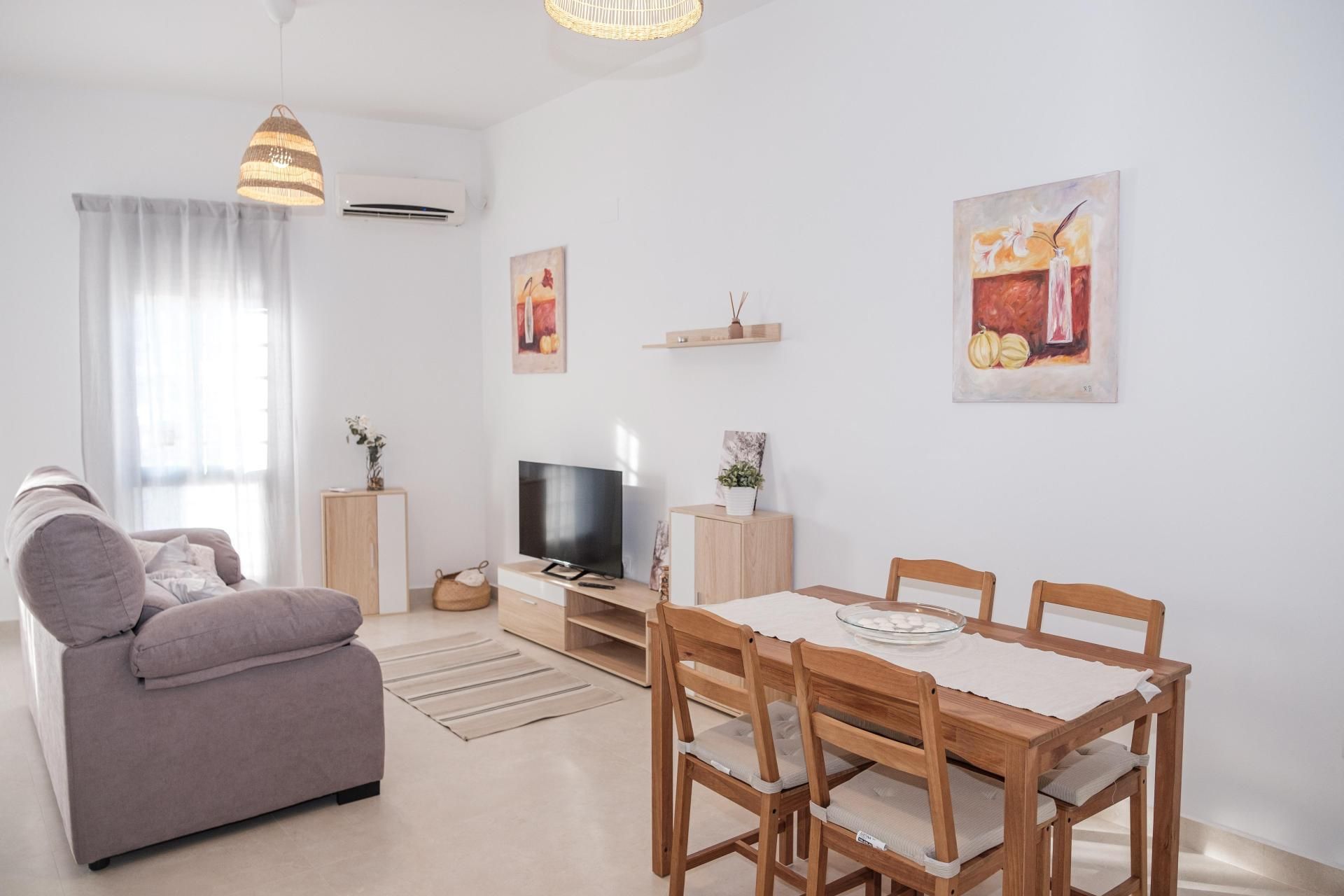 Sala d'estar de Pis de lloguer en Coria del Río amb Aire condicionat, Calefacció i Parquet