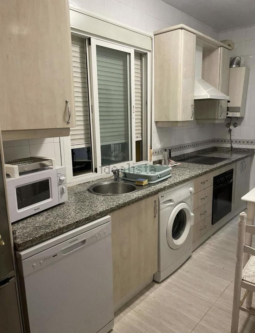 Kitchen of Apartment to rent in Pilas  with Parquet flooring, Terrace and Furnished
