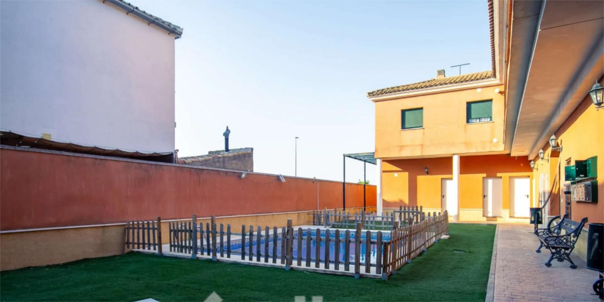 Exterior view of Flat for sale in Marchena  with Air Conditioner, Swimming Pool and Balcony