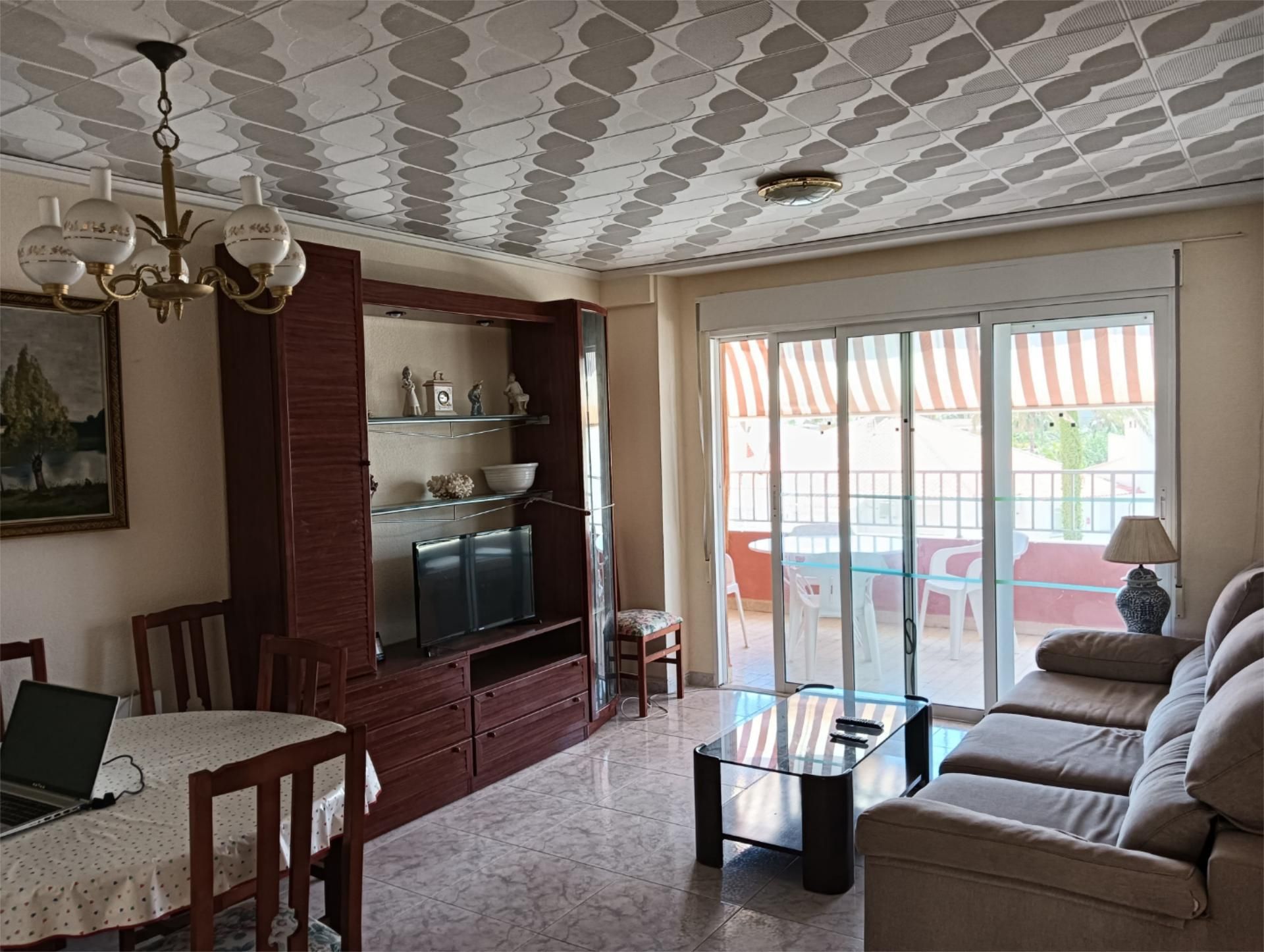 Sala de estar de Piso en venta en Gandia con Jardín privado, Terraza y Piscina