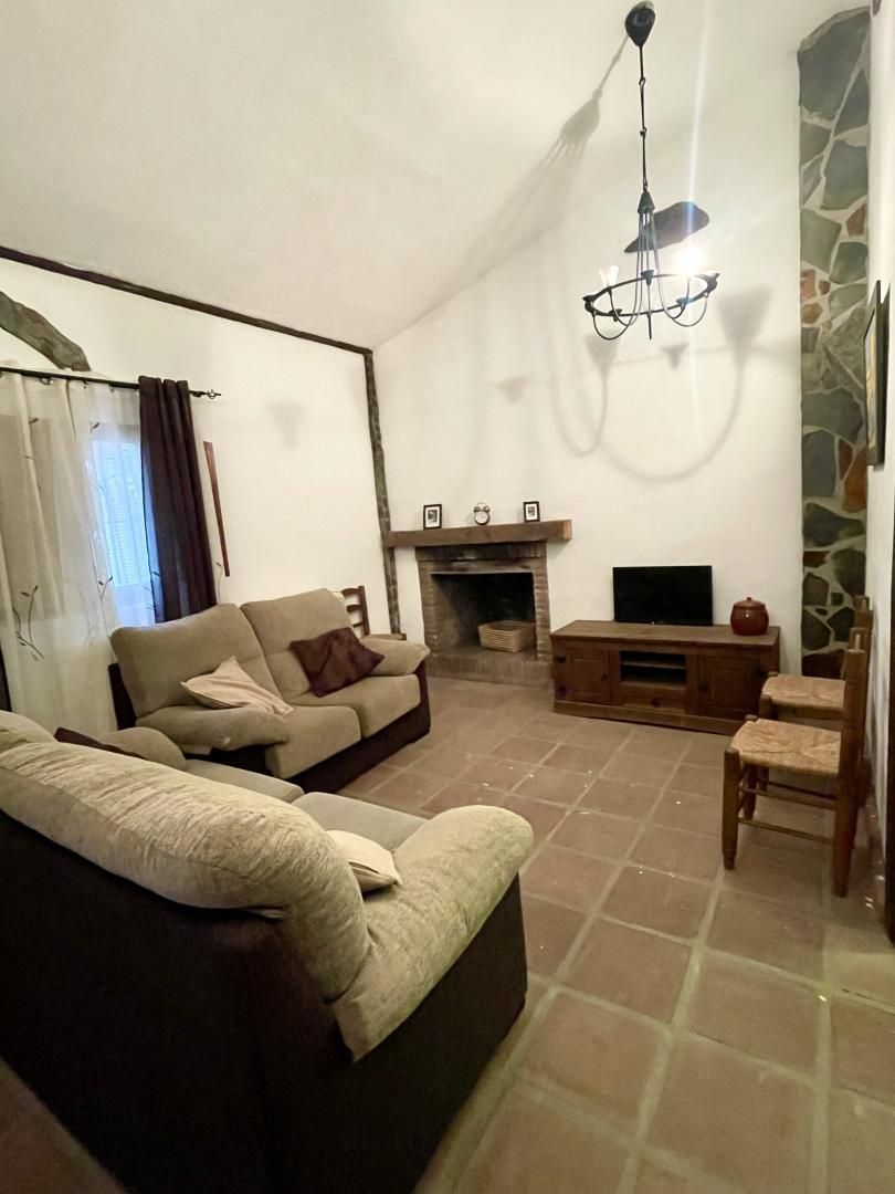 Living room of Country house for sale in Vélez-Málaga  with Heating, Private garden and Parquet flooring