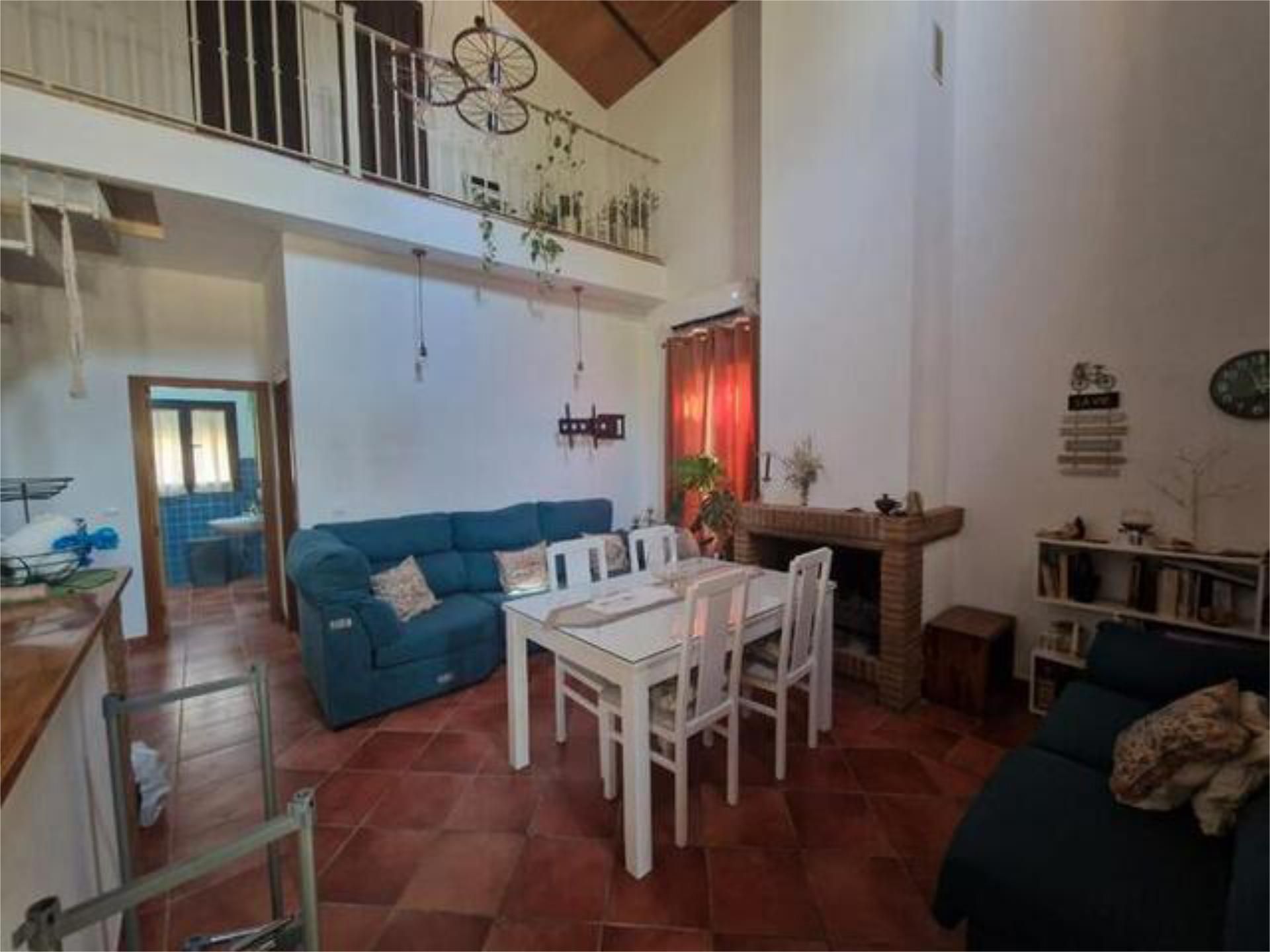 Sala d'estar de Casa adosada de lloguer en Osuna amb Calefacció, Jardí privat i Terrassa