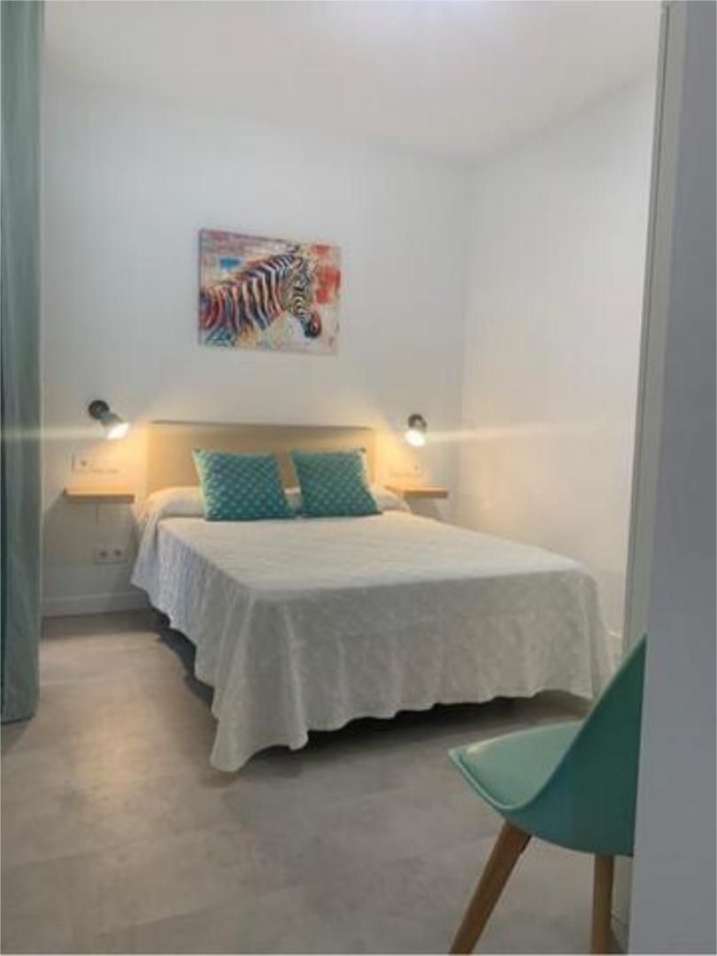 Dormitori de Apartament de lloguer en Chiclana de la Frontera amb Calefacció, Terrassa i Moblat