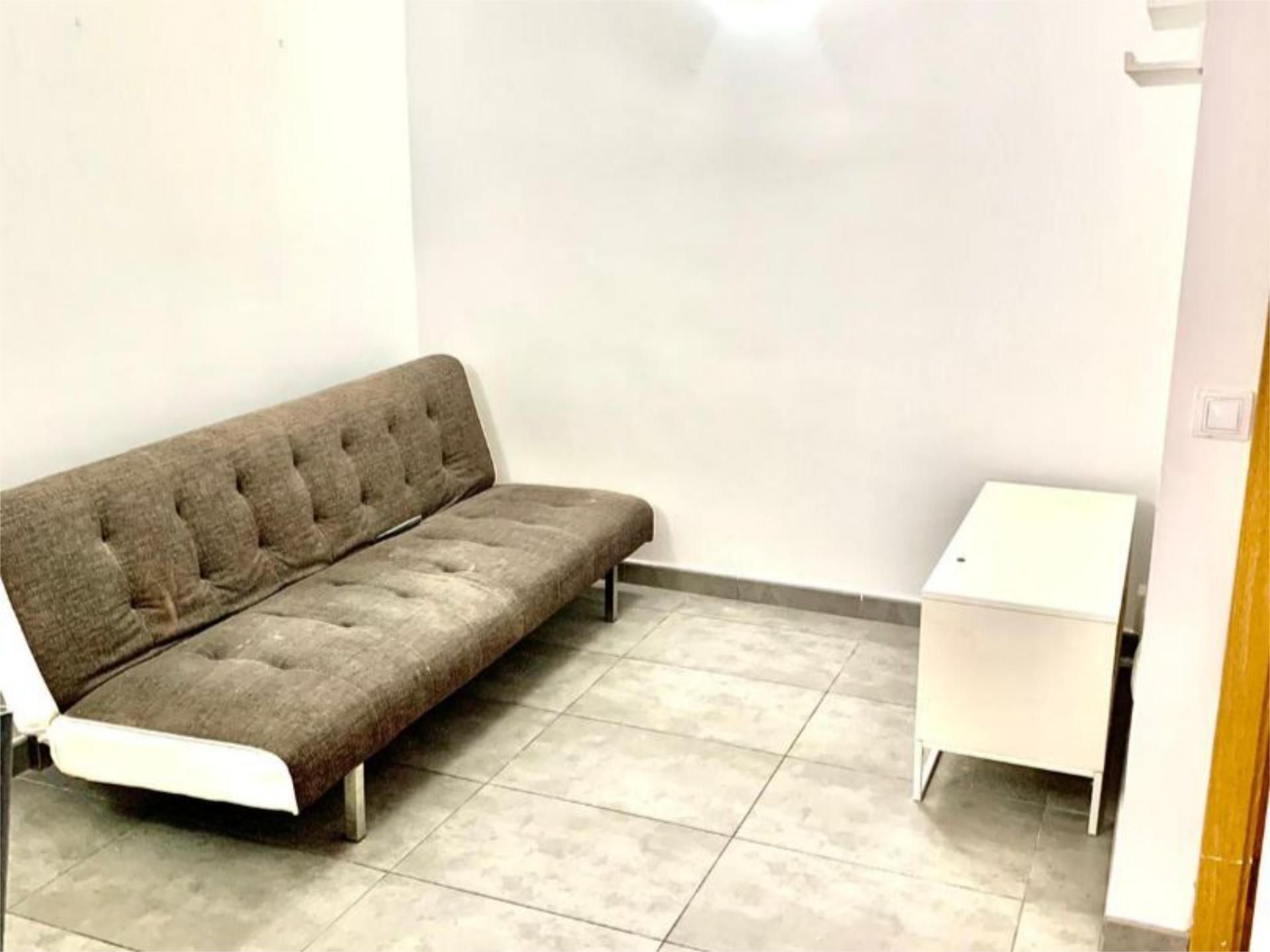 Sala d'estar de Apartament de lloguer en  Palma de Mallorca amb Aire condicionat i Balcó