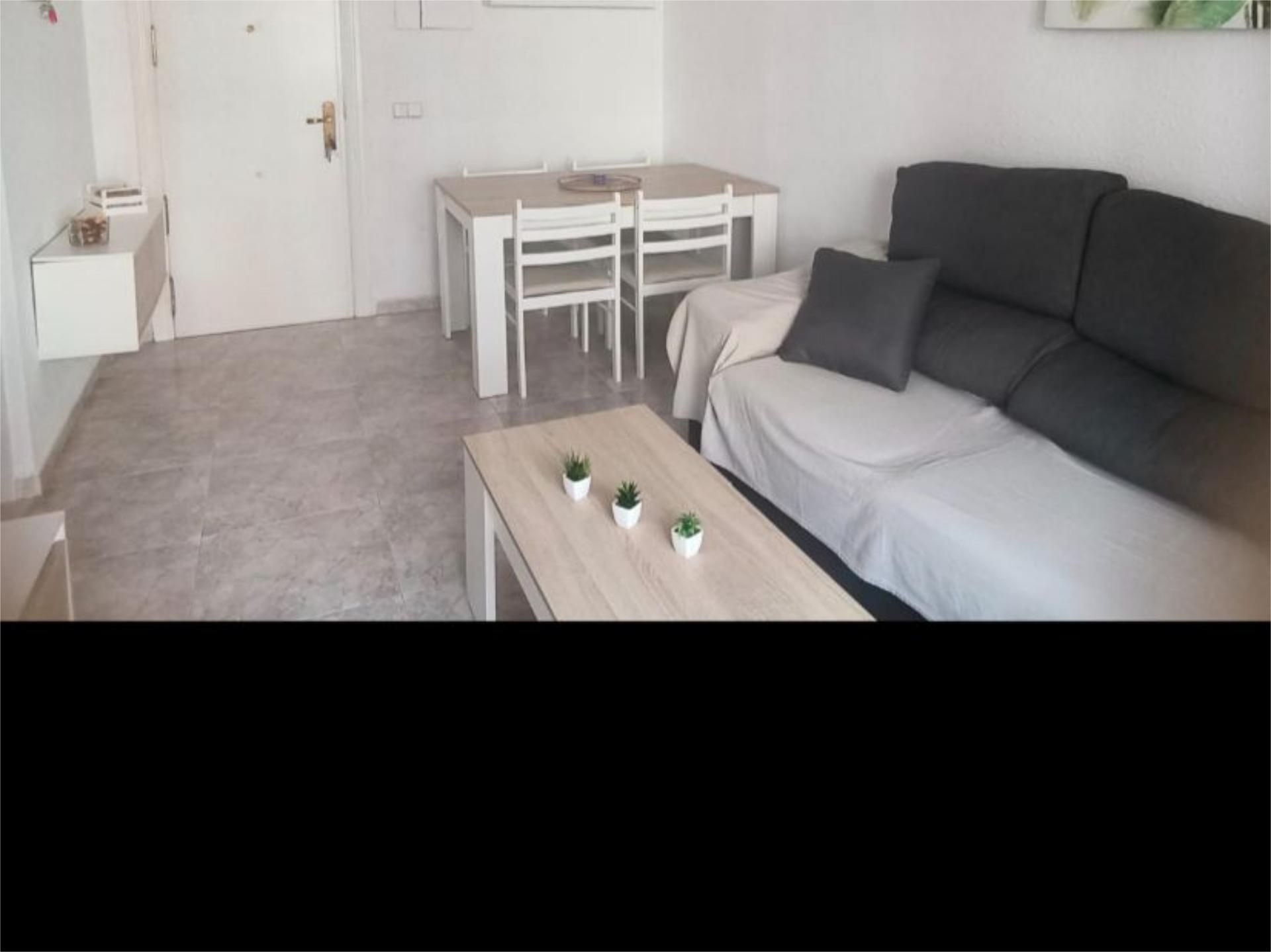 Sala de estar de Piso para compartir en Málaga Capital con Terraza y Amueblado