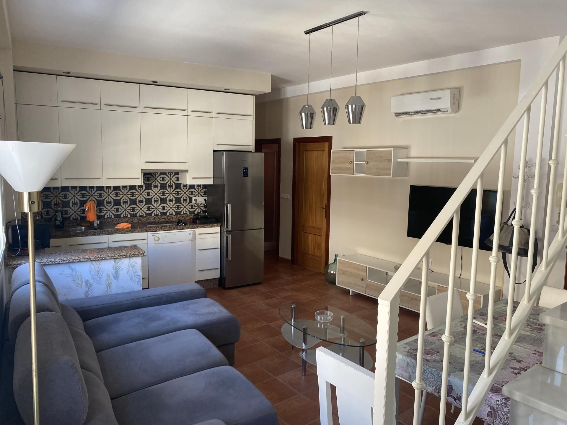 Living room of Single-family semi-detached to rent in Morón de la Frontera  with Air Conditioner, Parquet flooring and Terrace