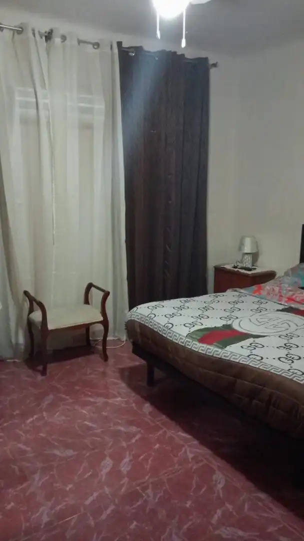 Casa adosada en venta en Calle Granada, 75, Martos Habitación de Casa adosada en venta en Martos con Aire acondicionado, Jardín privado y Piscina