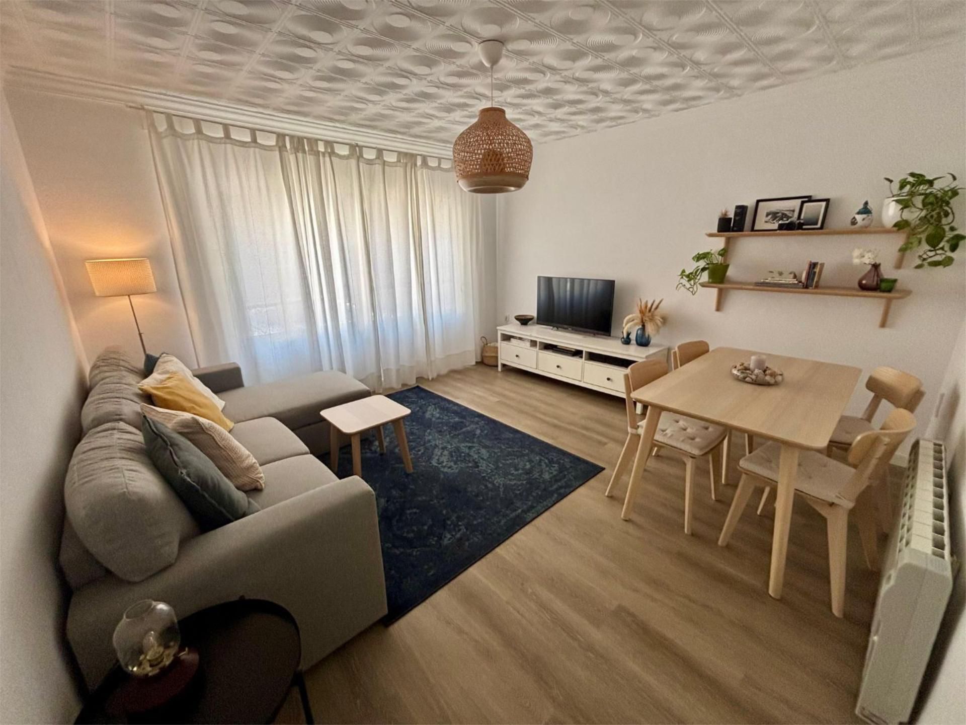 Sala d'estar de Casa adosada en venda en Roses amb Aire condicionat, Terrassa i Balcó