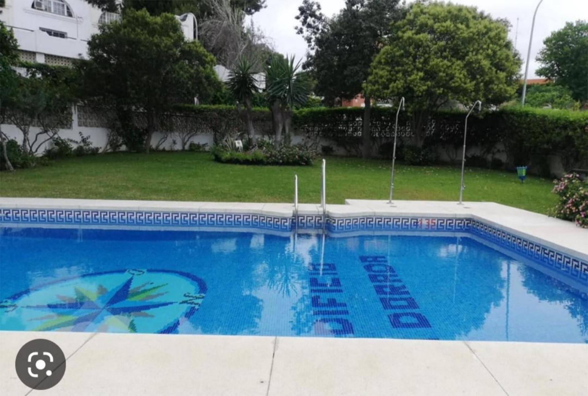 Swimming pool of Flat for sale in Torremolinos