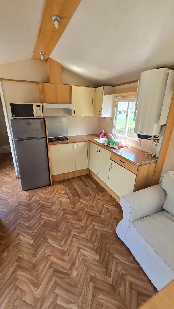 Cuina de Apartament de lloguer en Pineda de Mar amb Aire condicionat, Calefacció i Jardí privat