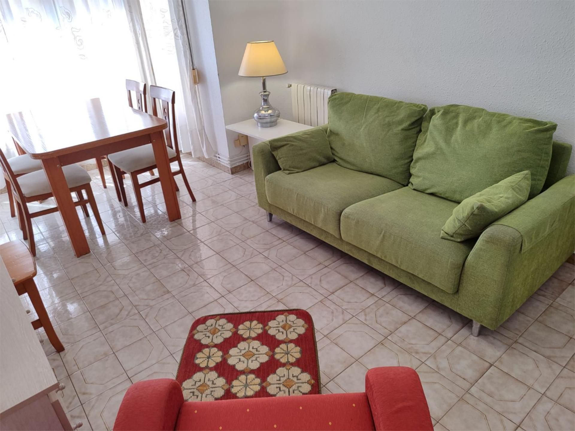 Sala de estar de Piso para compartir en  Lleida Capital con Calefacción, Parquet y Amueblado