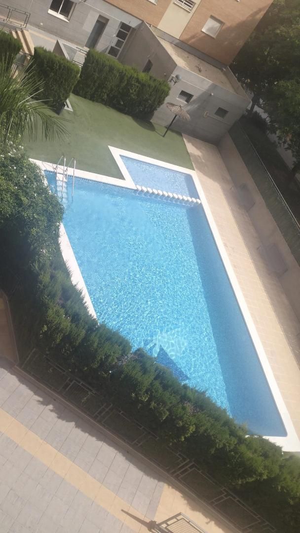 Swimming pool of Flat for sale in Alicante / Alacant  with Air Conditioner, Swimming Pool and Balcony
