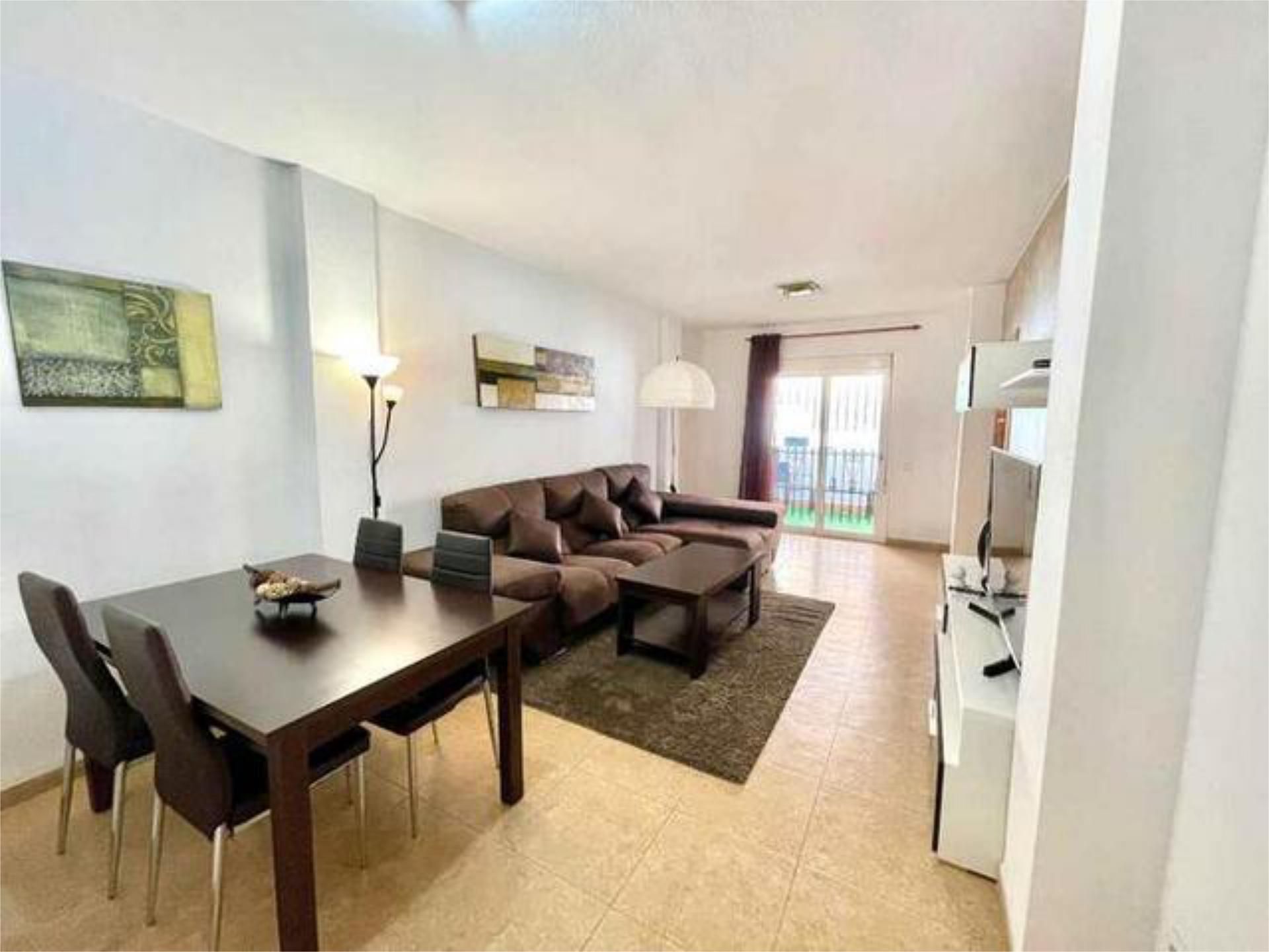 Sala d'estar de Pis en venda en Roquetas de Mar amb Jardí privat, Terrassa i Piscina