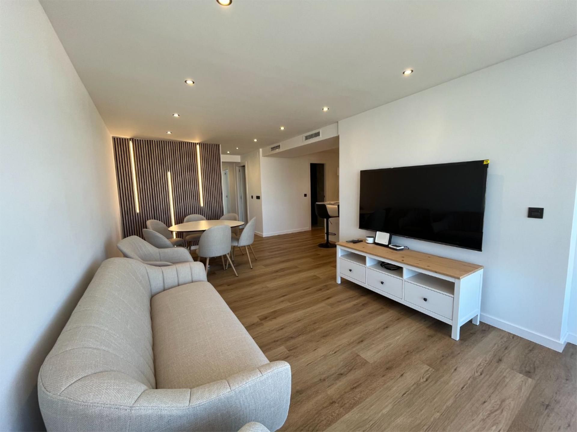 Sala d'estar de Pis de lloguer en Torremolinos amb Aire condicionat i Piscina