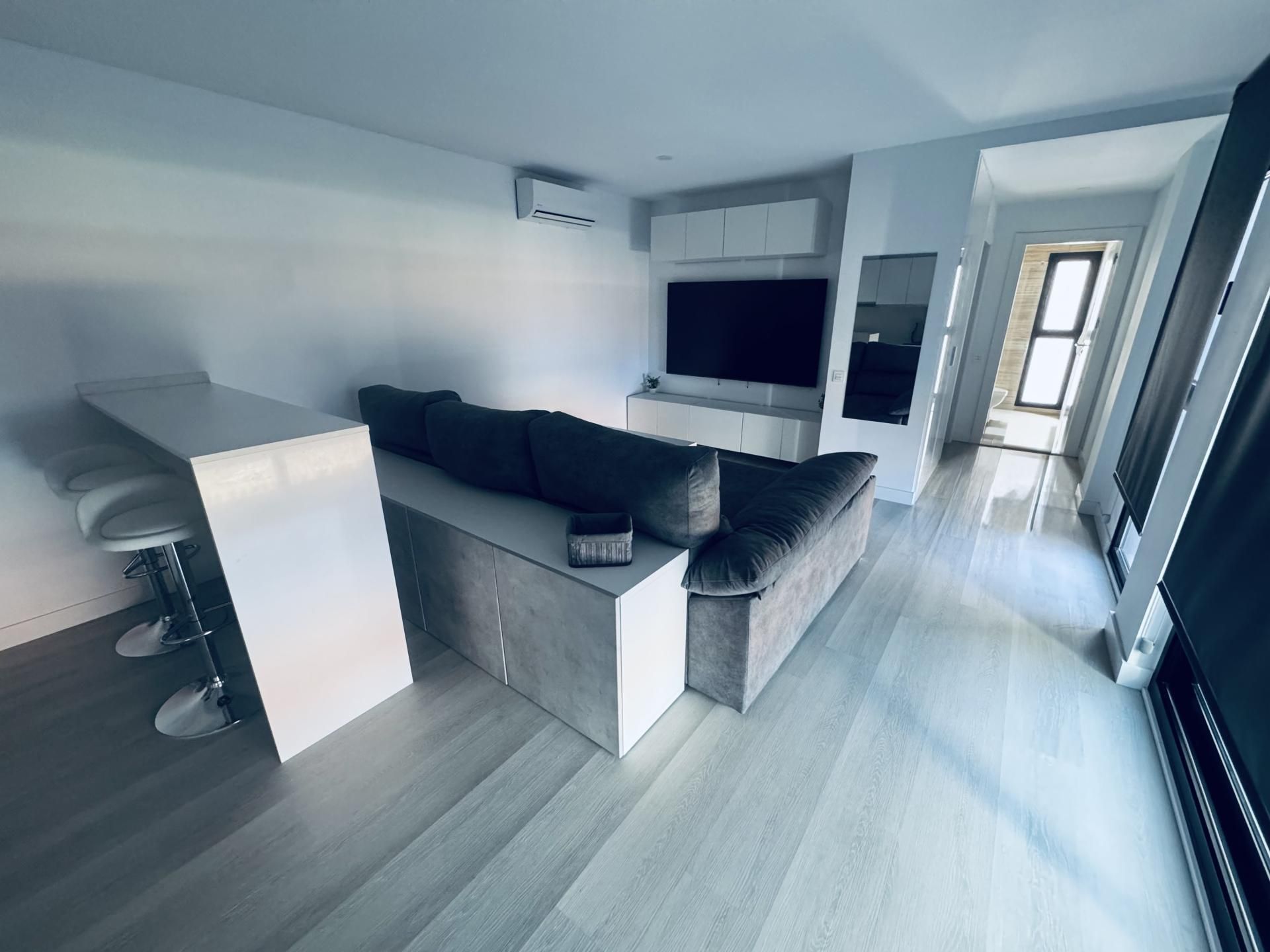 Living room of Flat to rent in Mogán  with Air Conditioner, Private garden and Terrace
