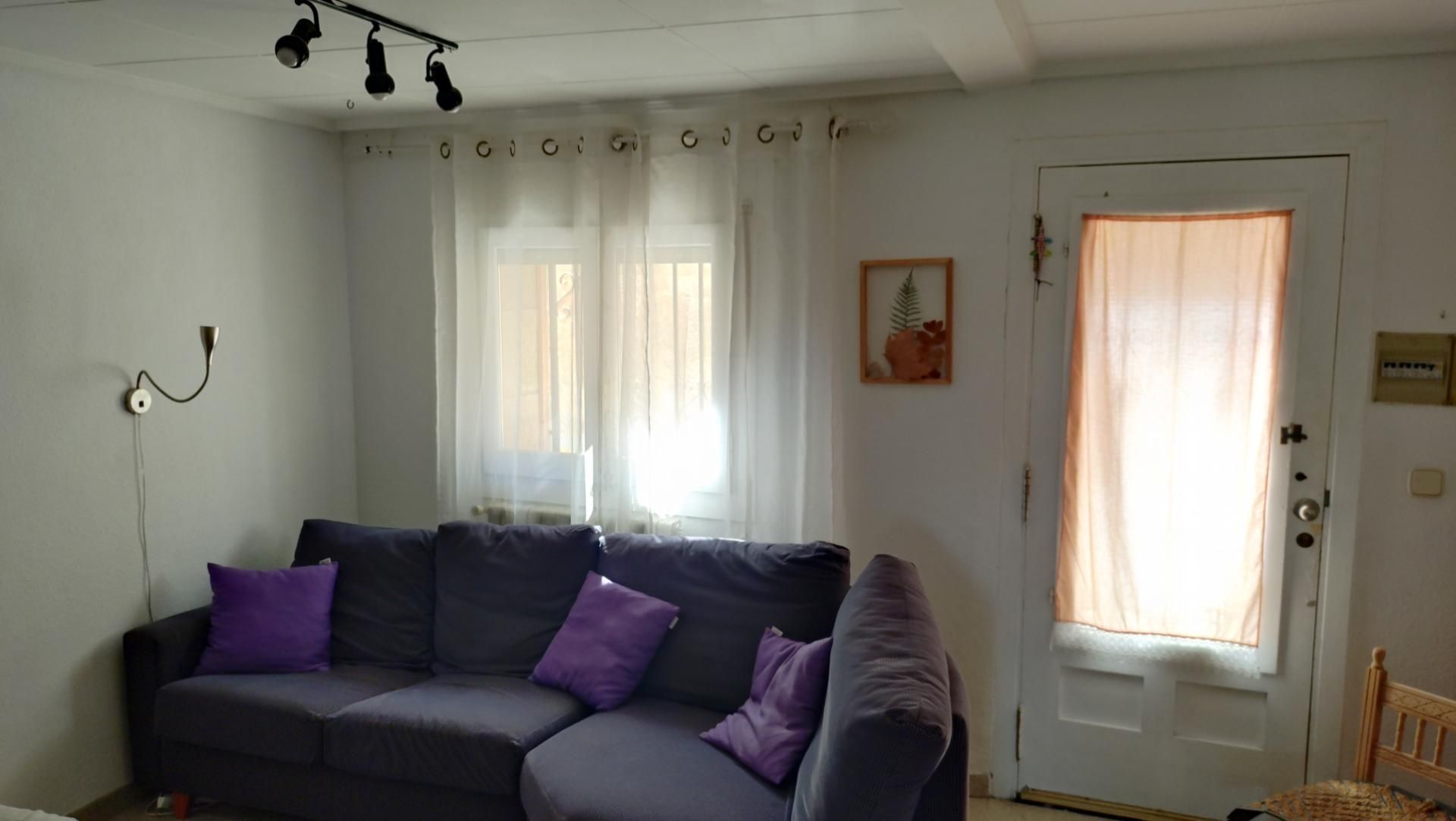 Sala de estar de Casa adosada en venta en Caspe con Aire acondicionado, Calefacción y Amueblado