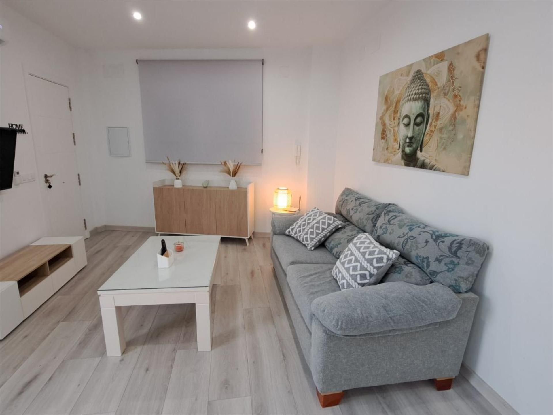 Sala d'estar de Pis de lloguer en La Puebla de Cazalla amb Aire condicionat, Calefacció i Parquet