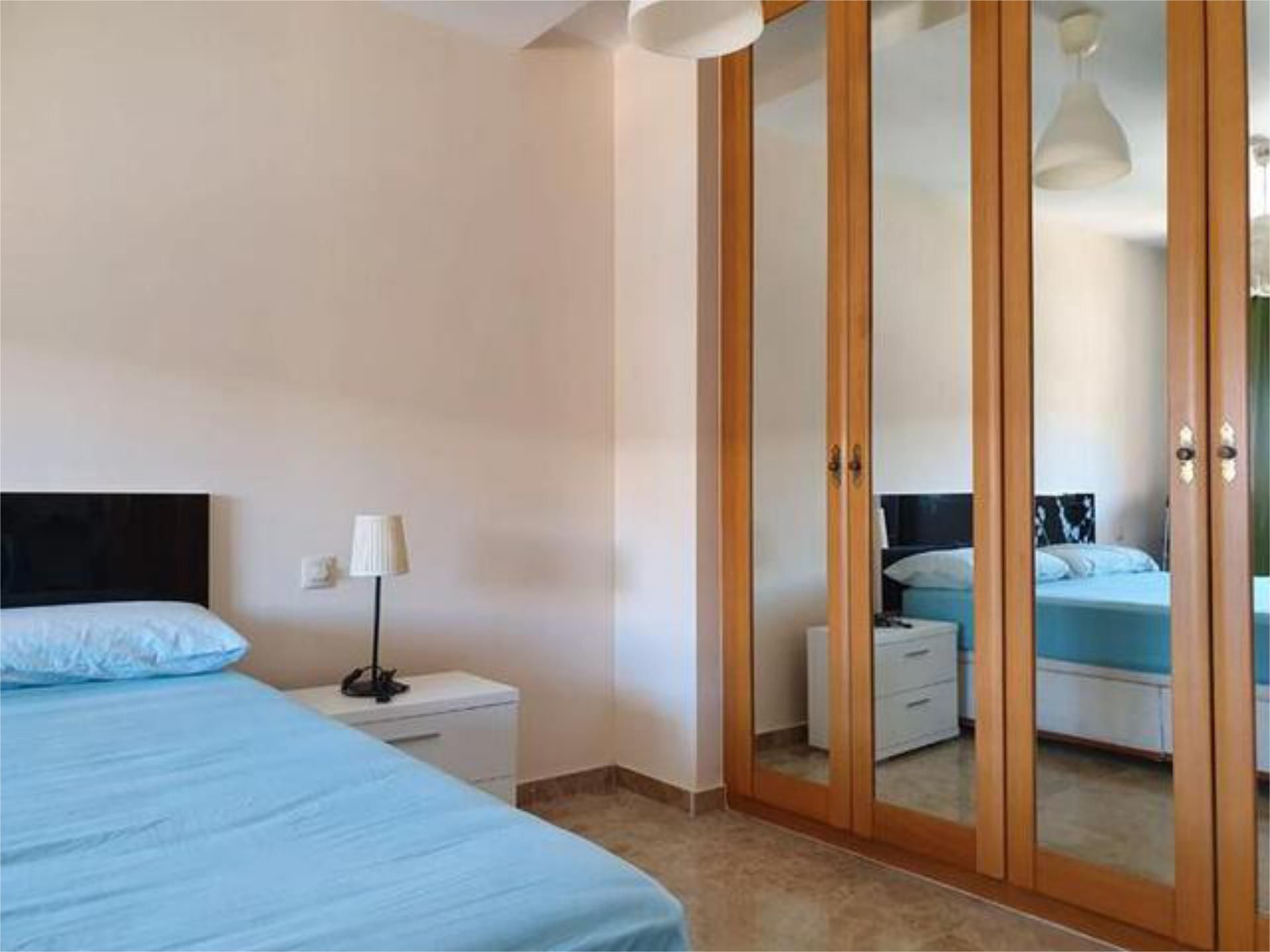Dormitori de Apartament de lloguer en Jerez de la Frontera amb Calefacció, Jardí privat i Piscina