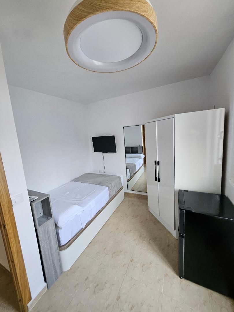 Dormitori de Pis per a compartir en Mérida amb Aire condicionat, Calefacció i Terrassa