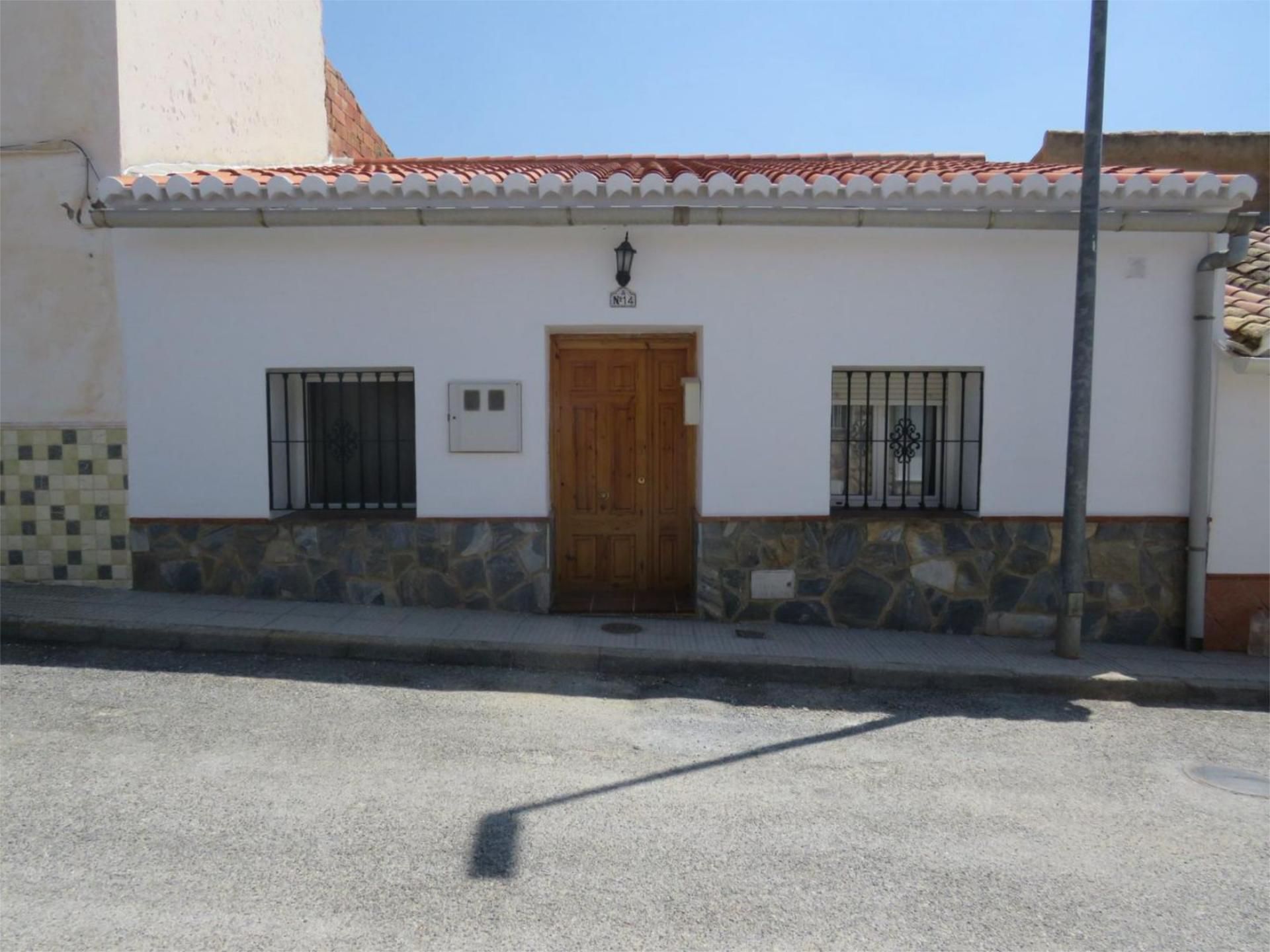 Exterior view of Single-family semi-detached for sale in Guadix  with Terrace