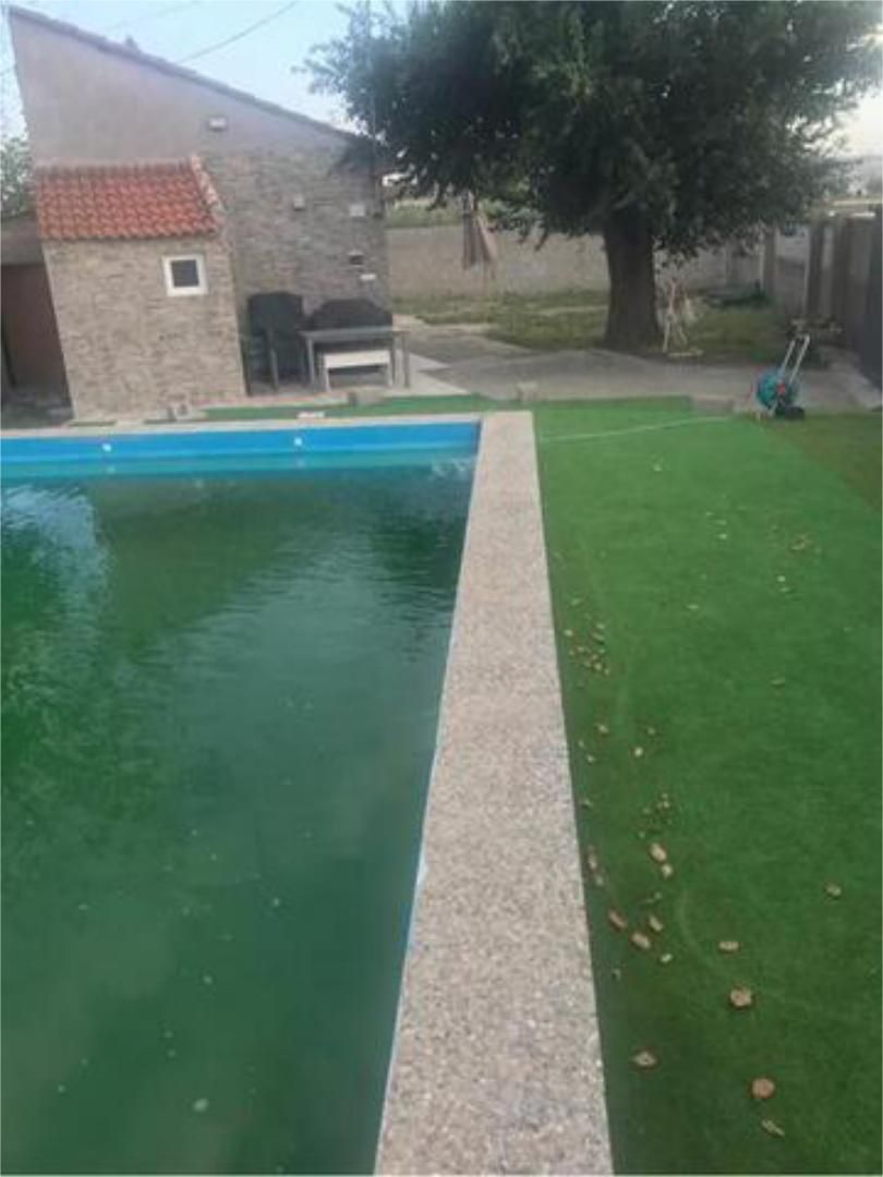 Piscina de Casa o xalet de lloguer en Cúllar Vega amb Calefacció, Jardí privat i Terrassa