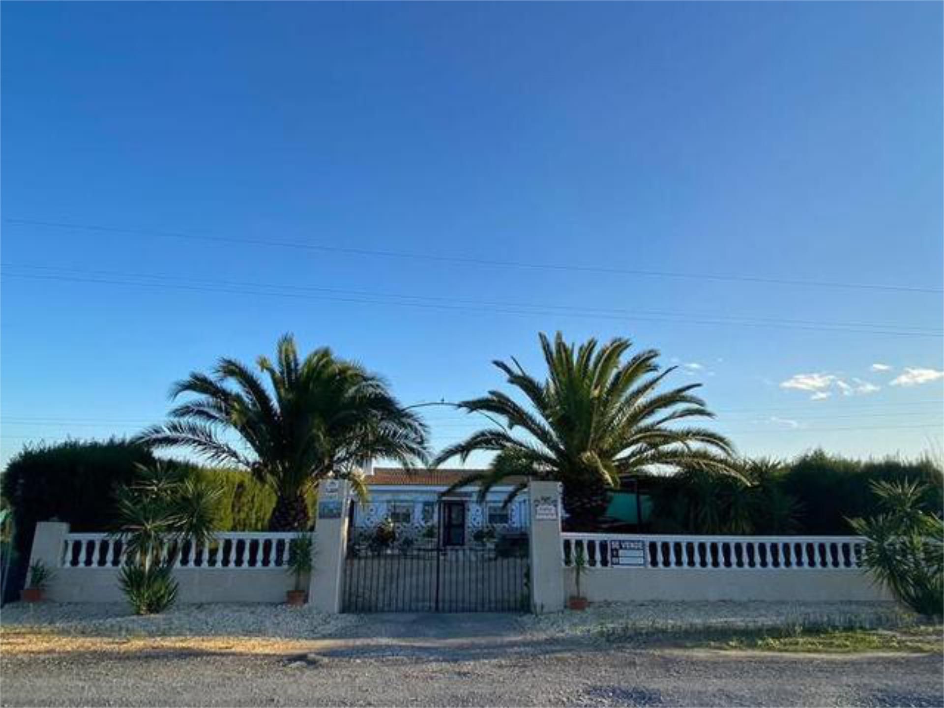 Vista exterior de Casa o xalet en venda en San Juan del Puerto amb Calefacció, Jardí privat i Terrassa