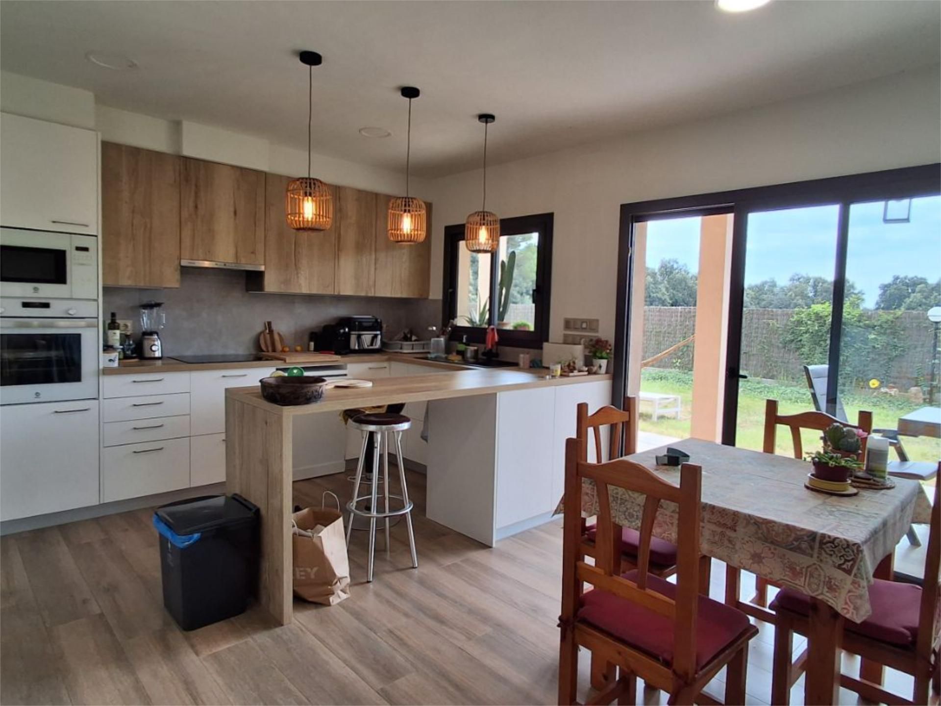 Kitchen of House or chalet to share in Aiguaviva  with Air Conditioner, Heating and Private garden