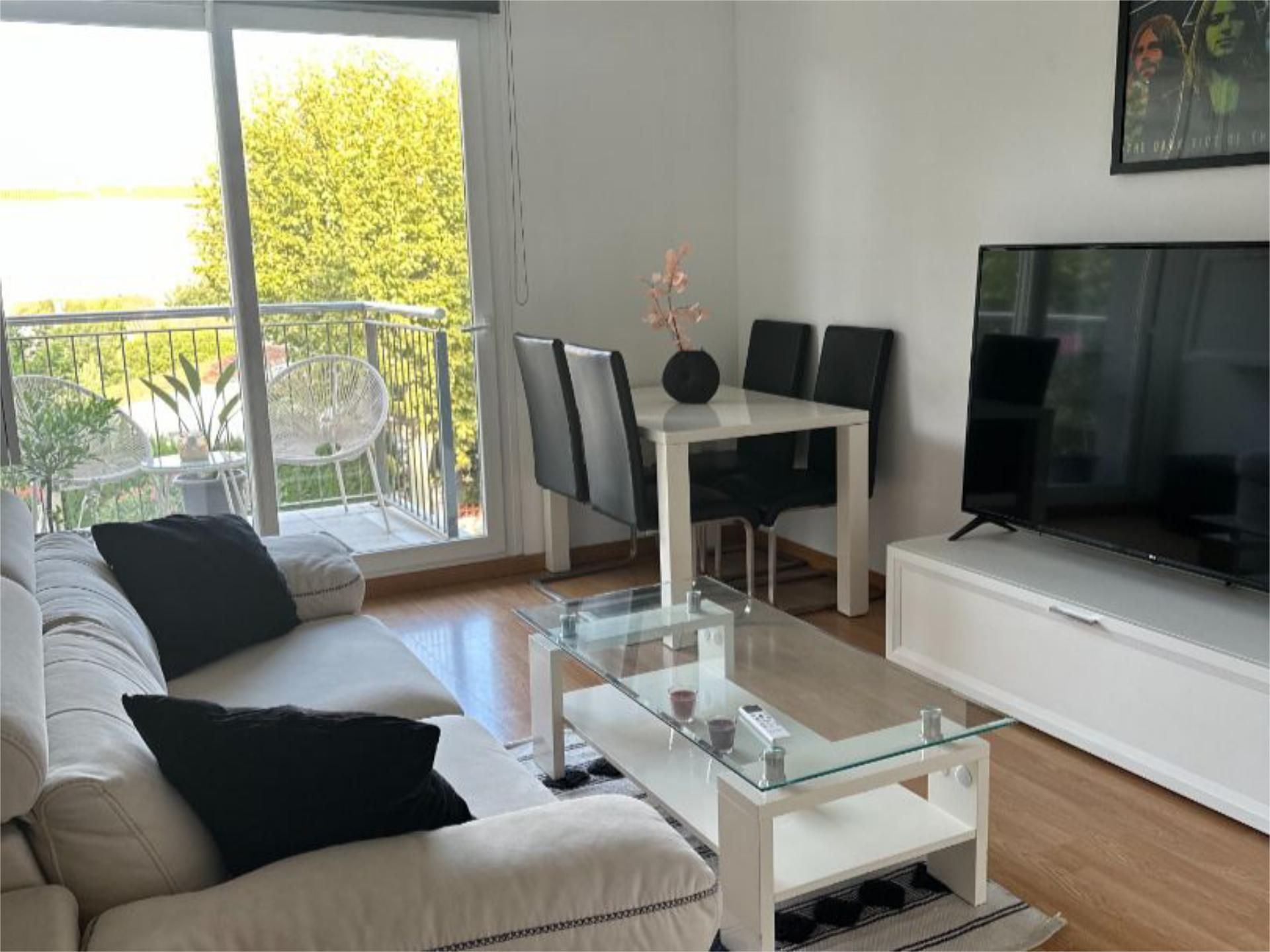 Living room of Flat for sale in Empuriabrava  with Air Conditioner, Terrace and Swimming Pool