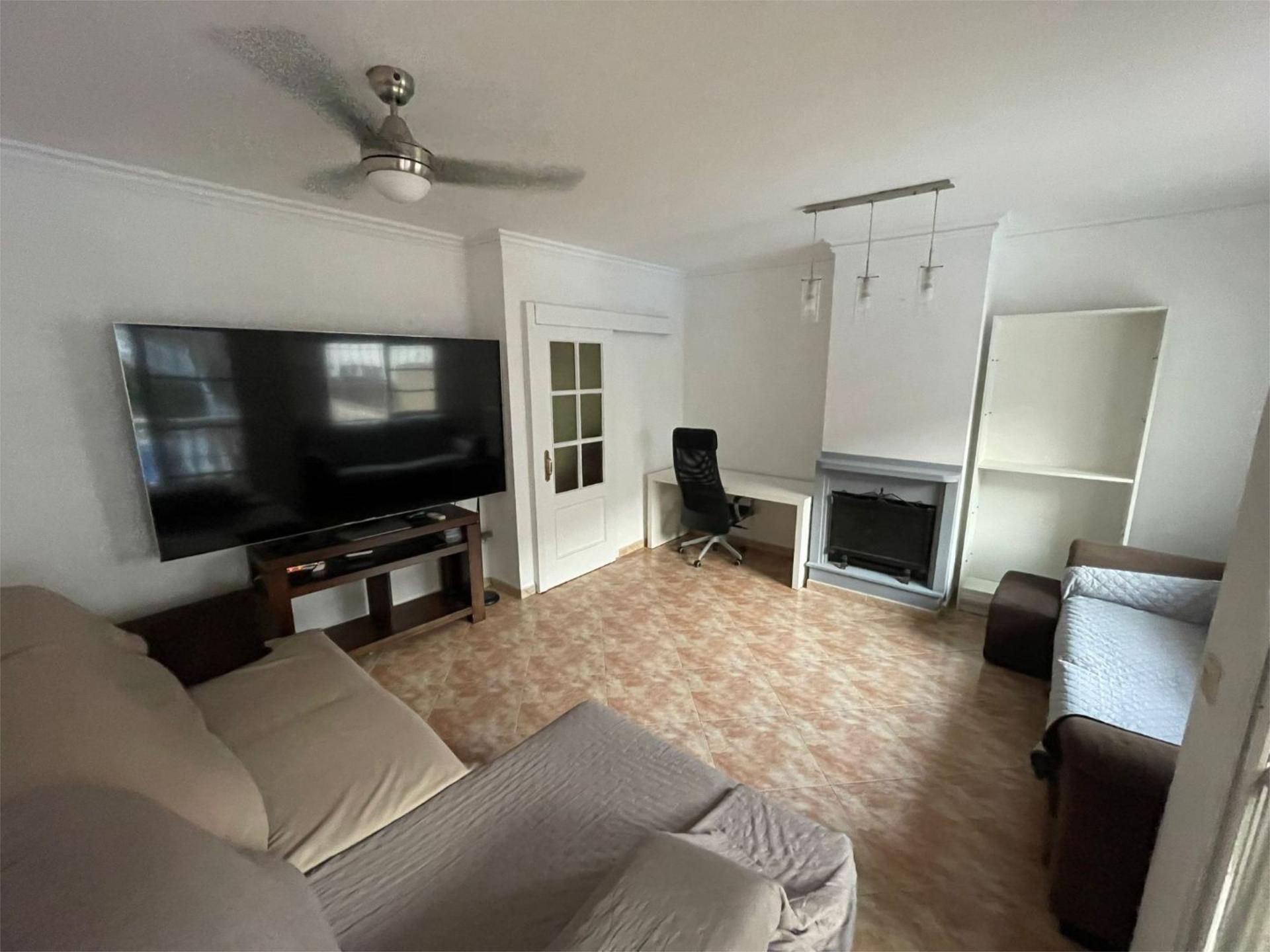 Living room of Single-family semi-detached for sale in Rincón de la Victoria  with Air Conditioner, Terrace and Swimming Pool