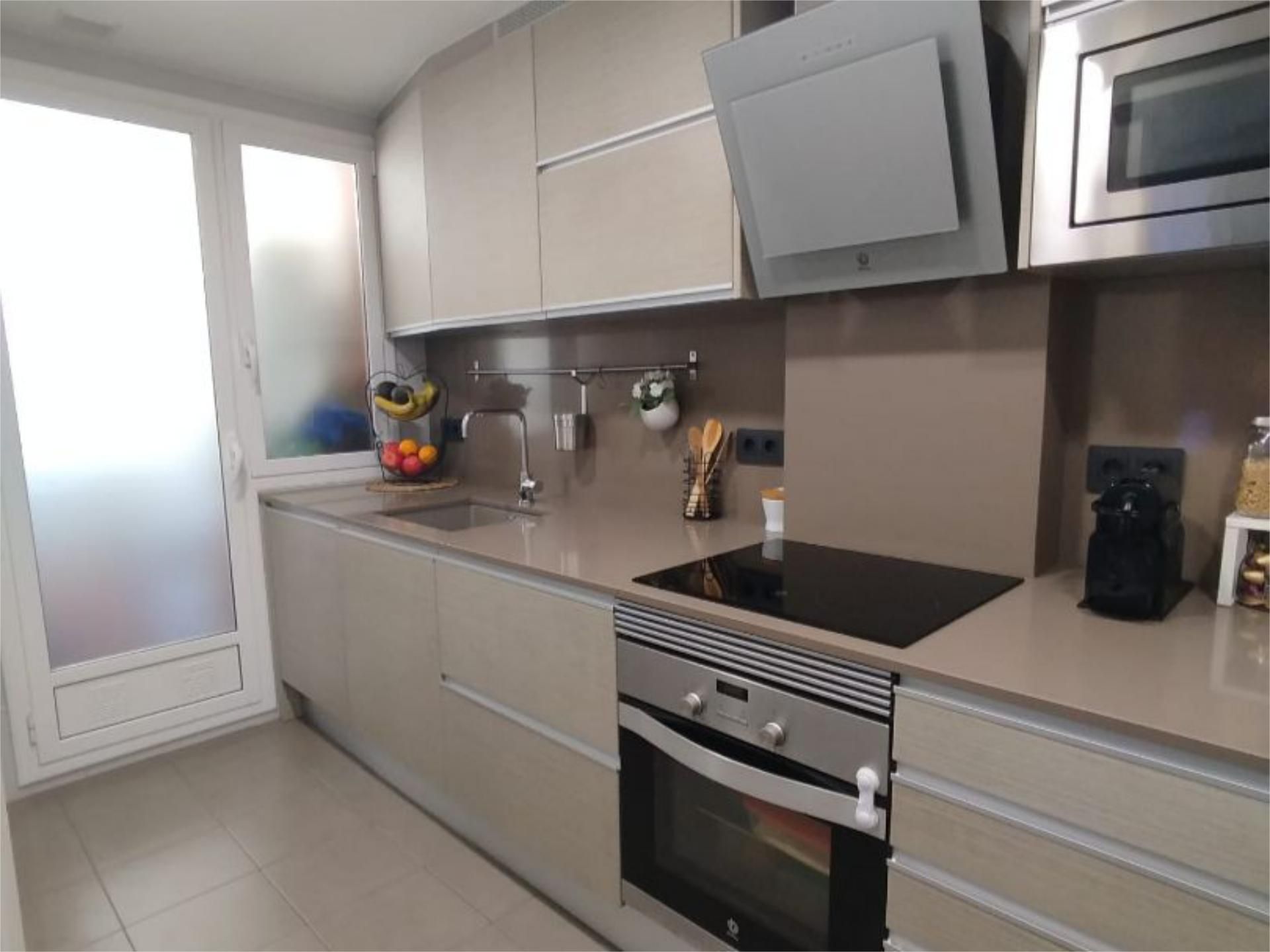 Kitchen of Flat for sale in Sabadell  with Air Conditioner and Balcony