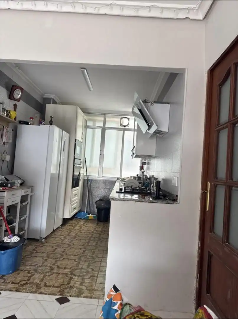 Room in Calle Mar del Plata, 1, El Tardón - El Carmen Kitchen of Flat for share in Sevilla with Air Conditioner, Private garden and Terrace