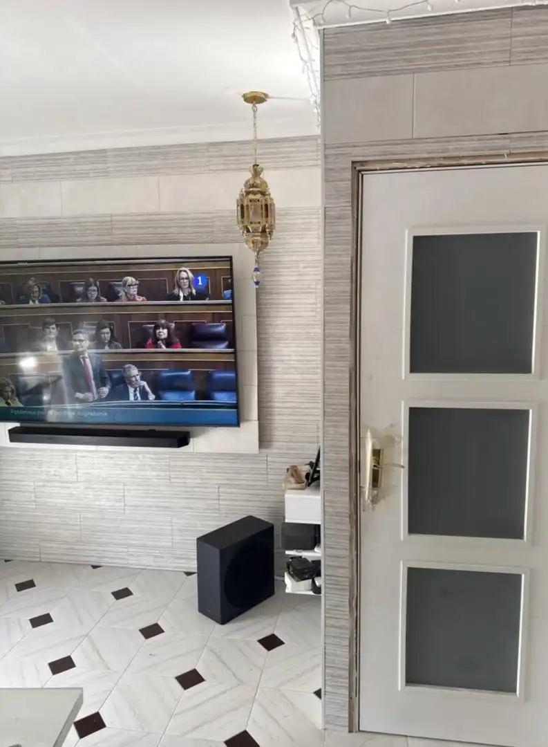 Room in Calle Mar del Plata, 1, El Tardón - El Carmen Living room of Flat for share in Sevilla with Air Conditioner, Private garden and Terrace