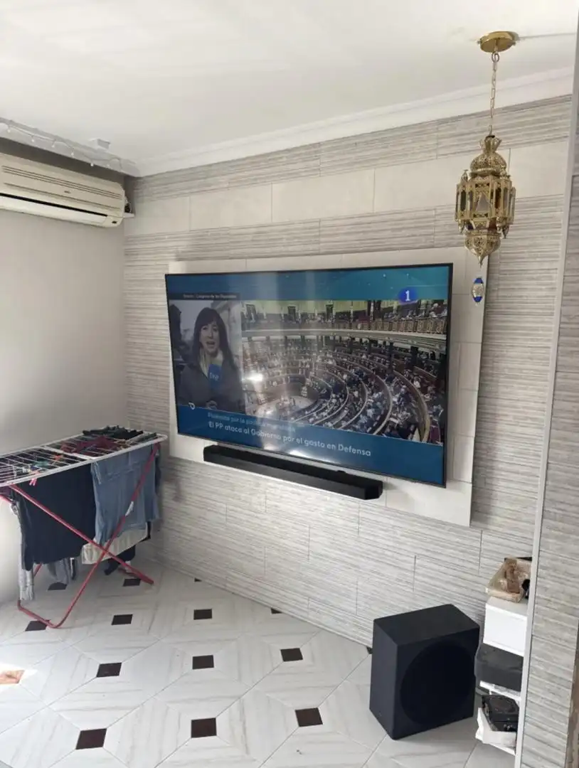 Room in Calle Mar del Plata, 1, El Tardón - El Carmen Living room of Flat for share in Sevilla with Air Conditioner, Private garden and Terrace