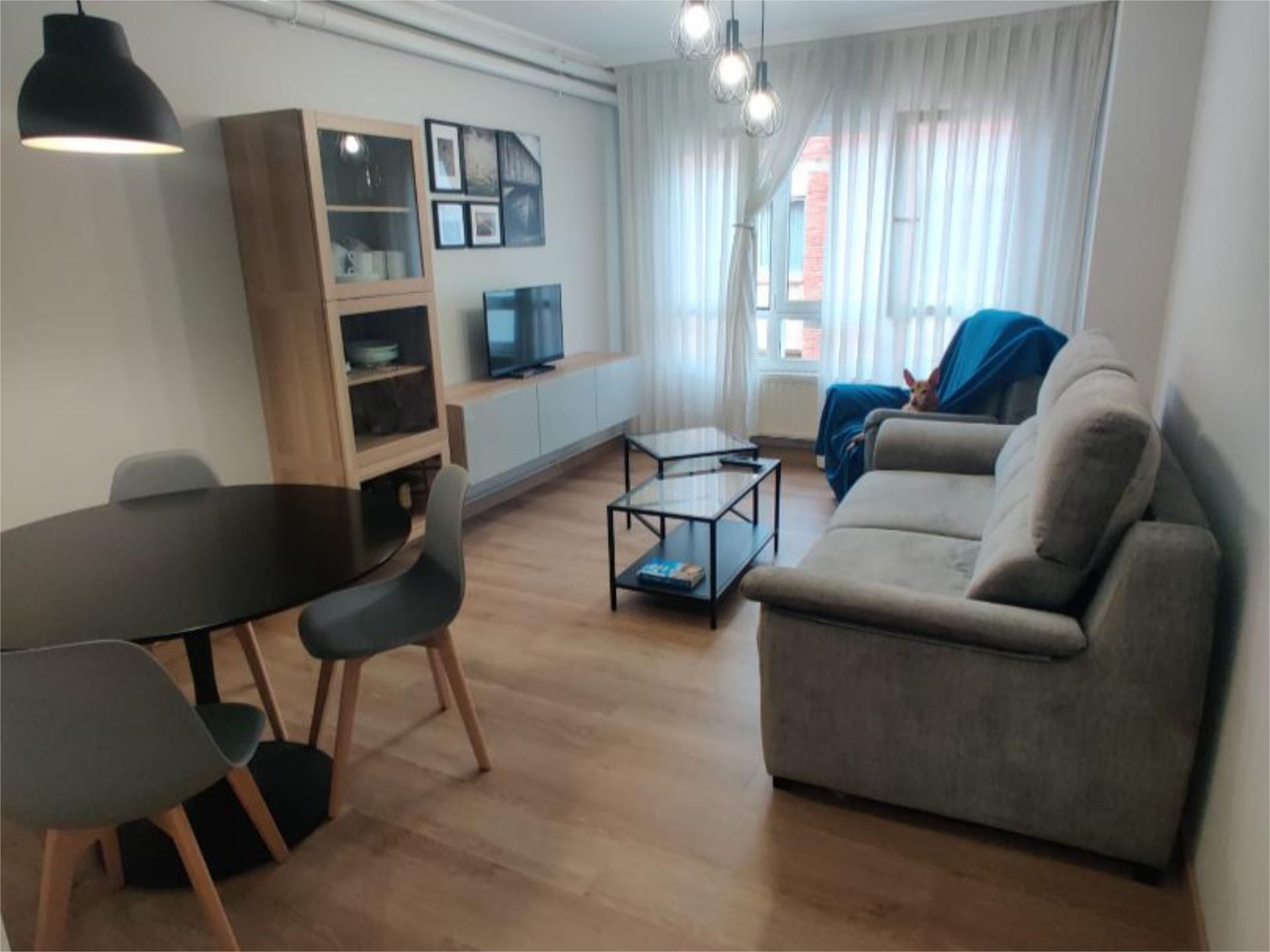 Living room of Flat to rent in Gozón  with Heating, Parquet flooring and Storage room