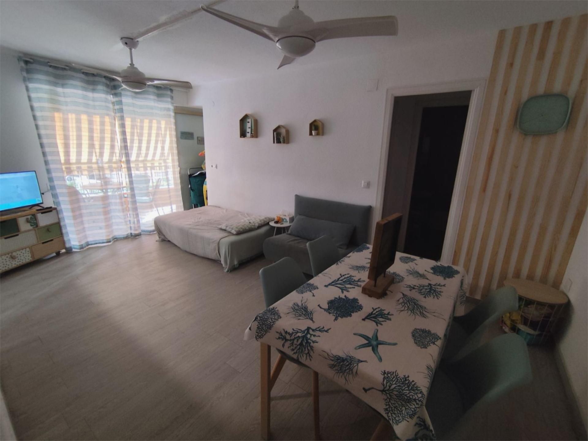 Dormitori de Apartament de lloguer en Cullera amb Parquet, Piscina i Moblat