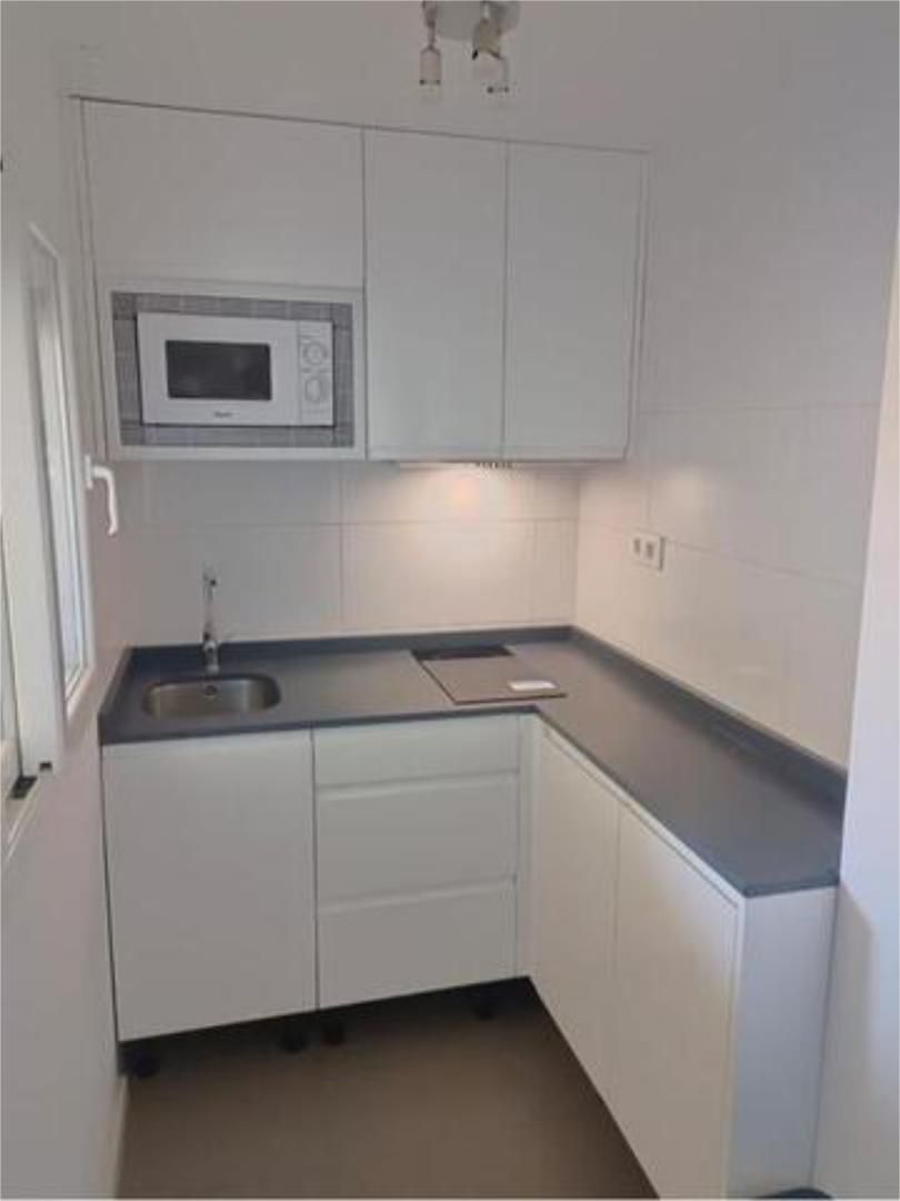 Cuina de Apartament de lloguer en Salou amb Terrassa, Piscina i Moblat