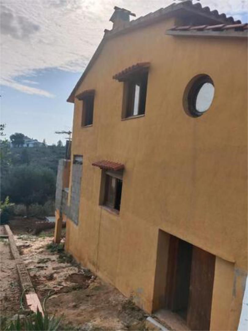 Vista exterior de Casa adosada de lloguer en Catadau amb Jardí privat, Traster i Es permeten mascotes