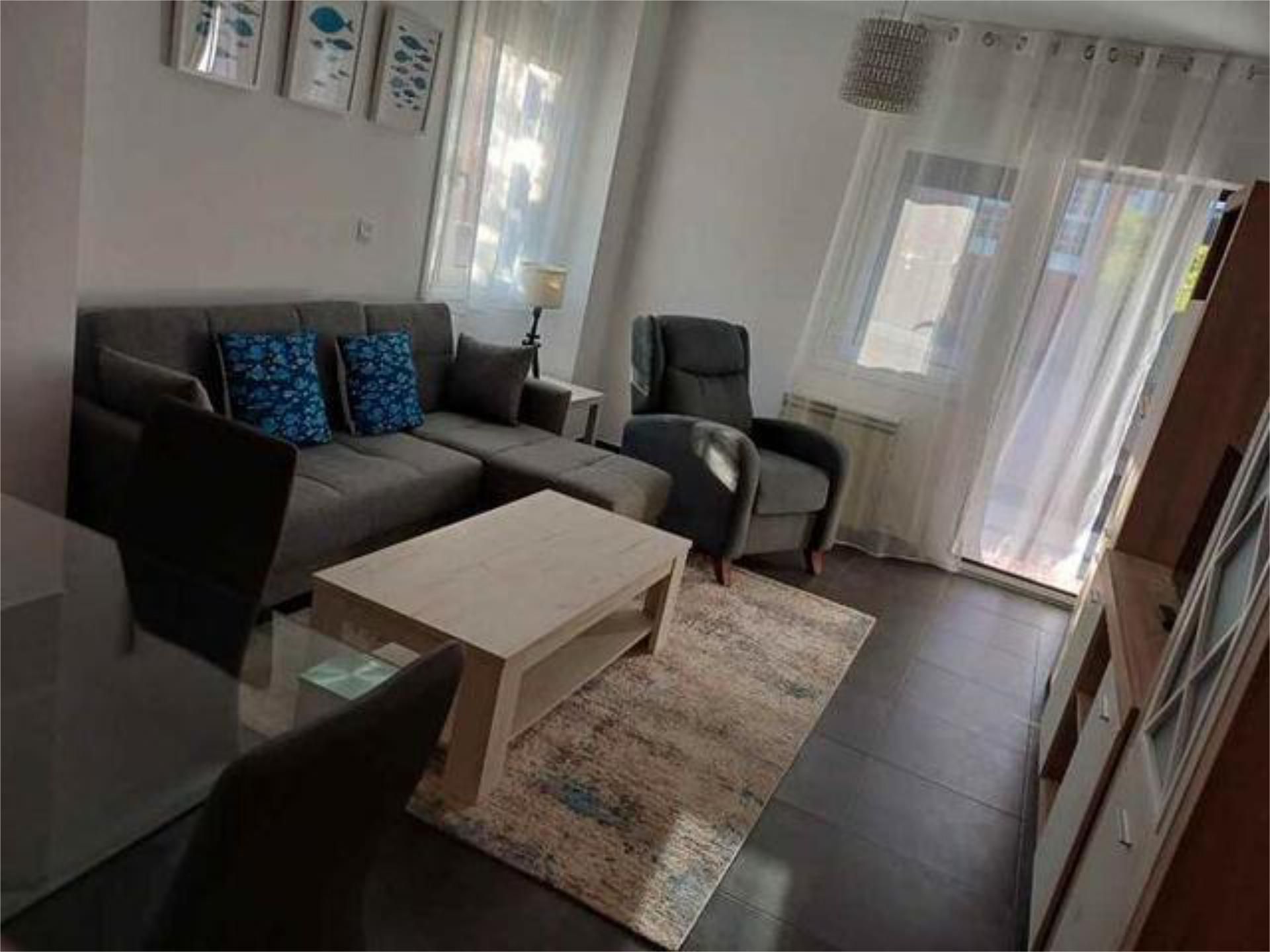 Sala d'estar de Apartament de lloguer en Xove amb Calefacció, Terrassa i Piscina