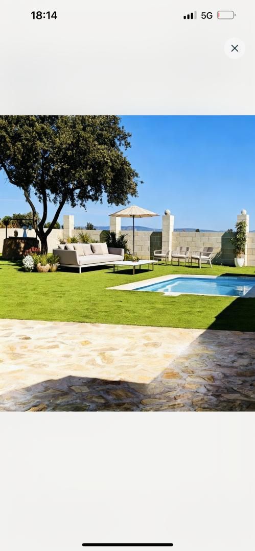 Terrassa de Casa adosada en venda en El Robledo   amb Aire condicionat, Calefacció i Jardí privat